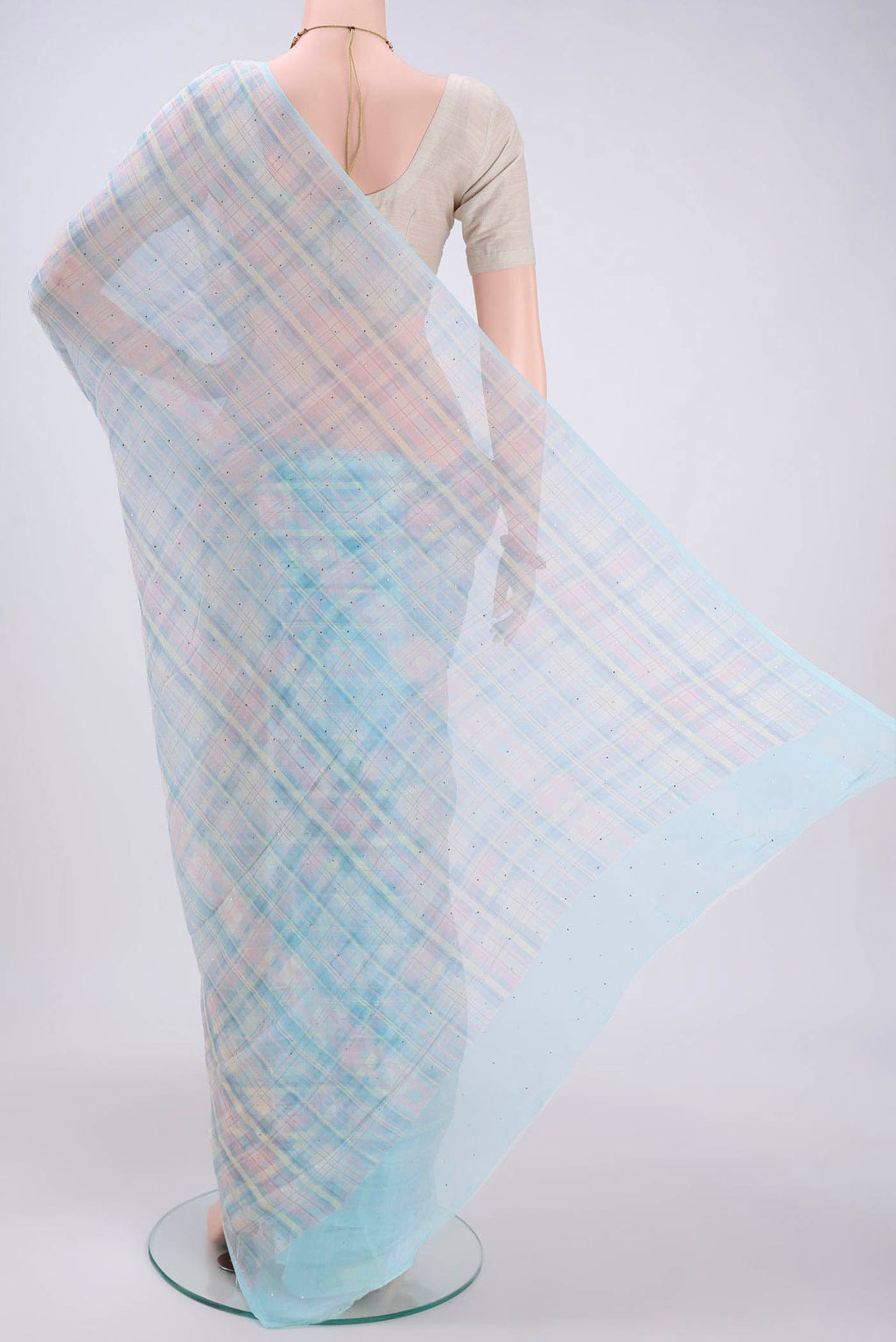 Flat view of Sky Blue Mysore Chiffon Saree with Checked design on the body and Without Border. 