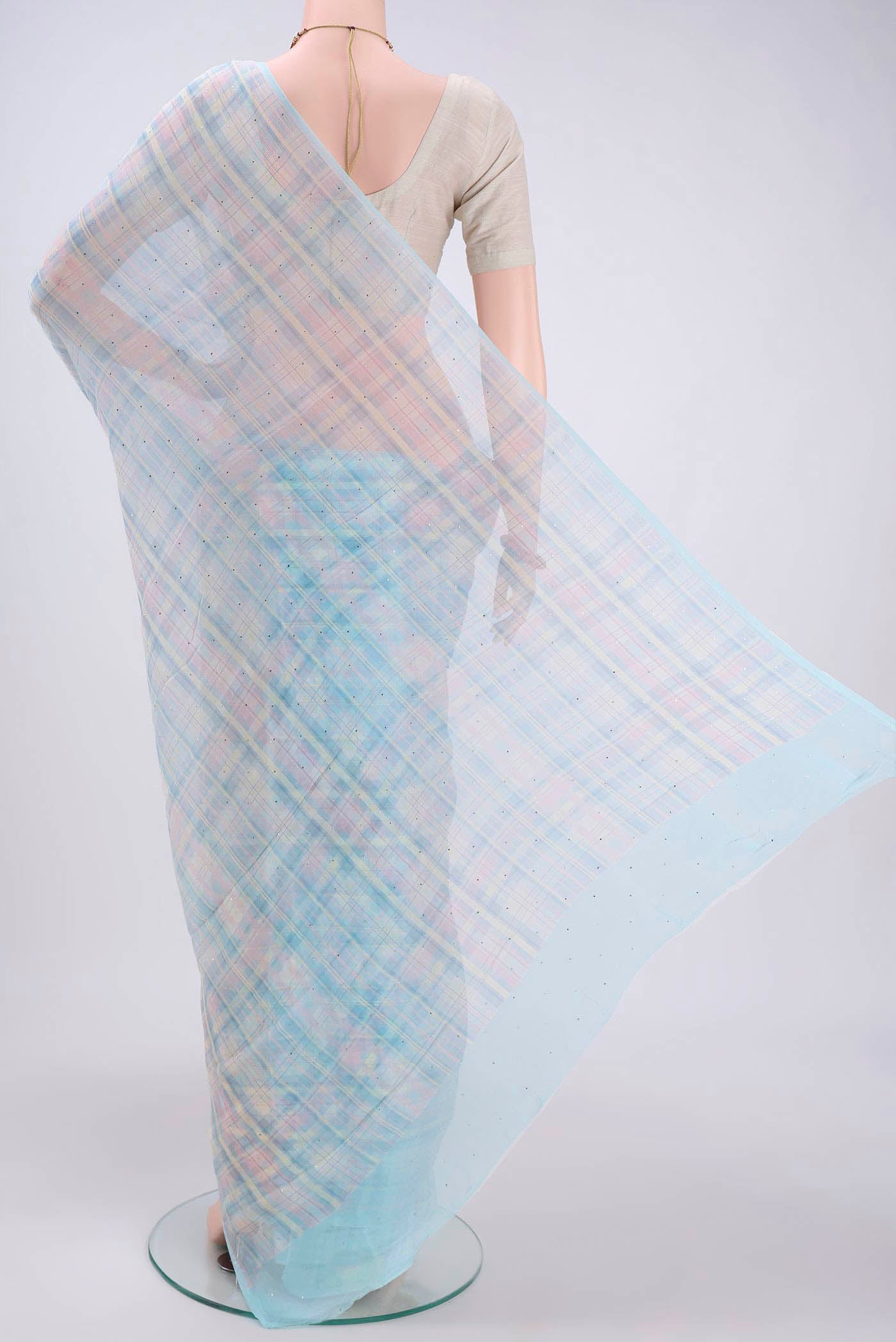 Flat view of Sky Blue Mysore Chiffon Saree with Checked design on the body and Without Border. 