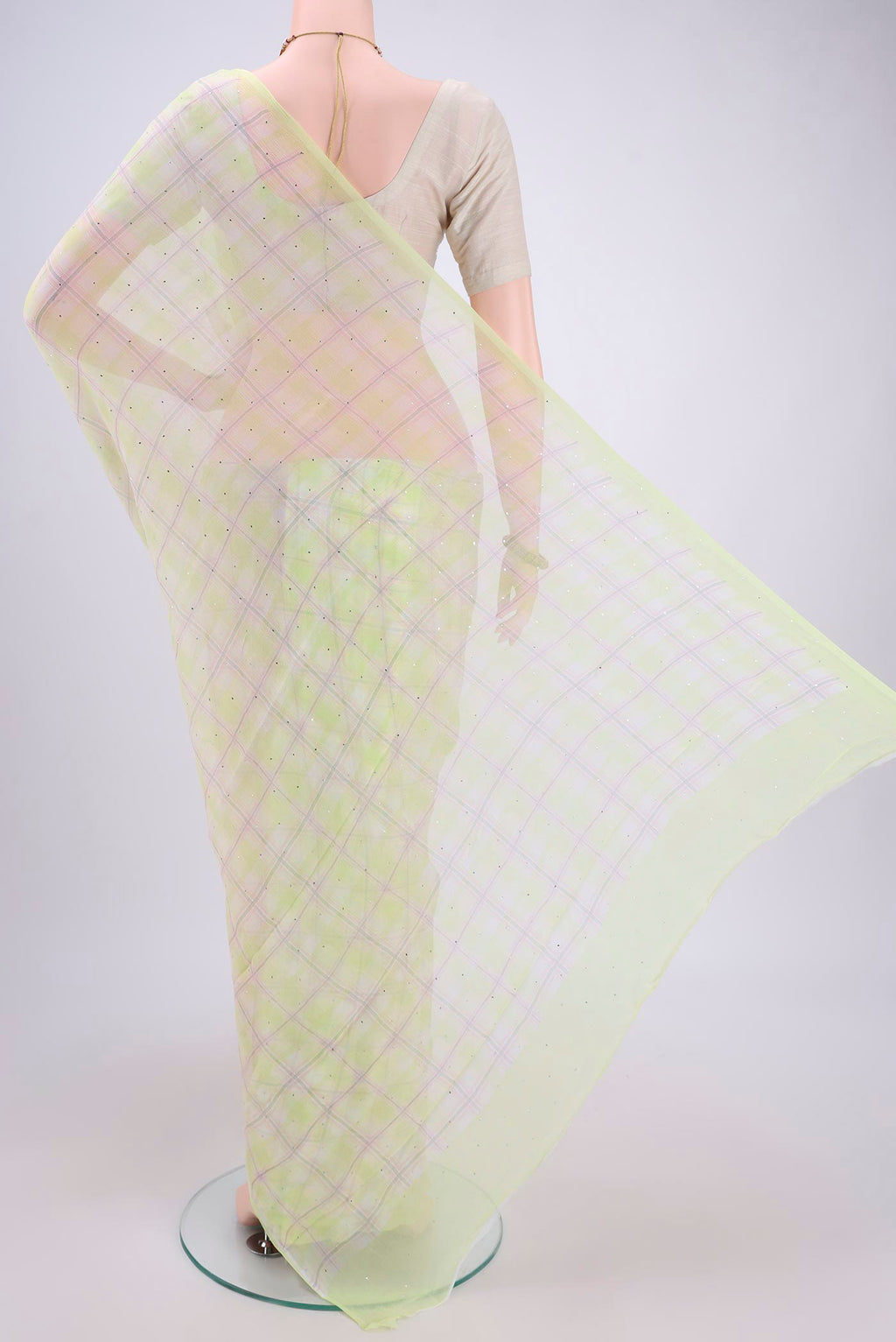 Flat view of Light Green Mysore Chiffon Saree with Checked design on the body and Without Border. 