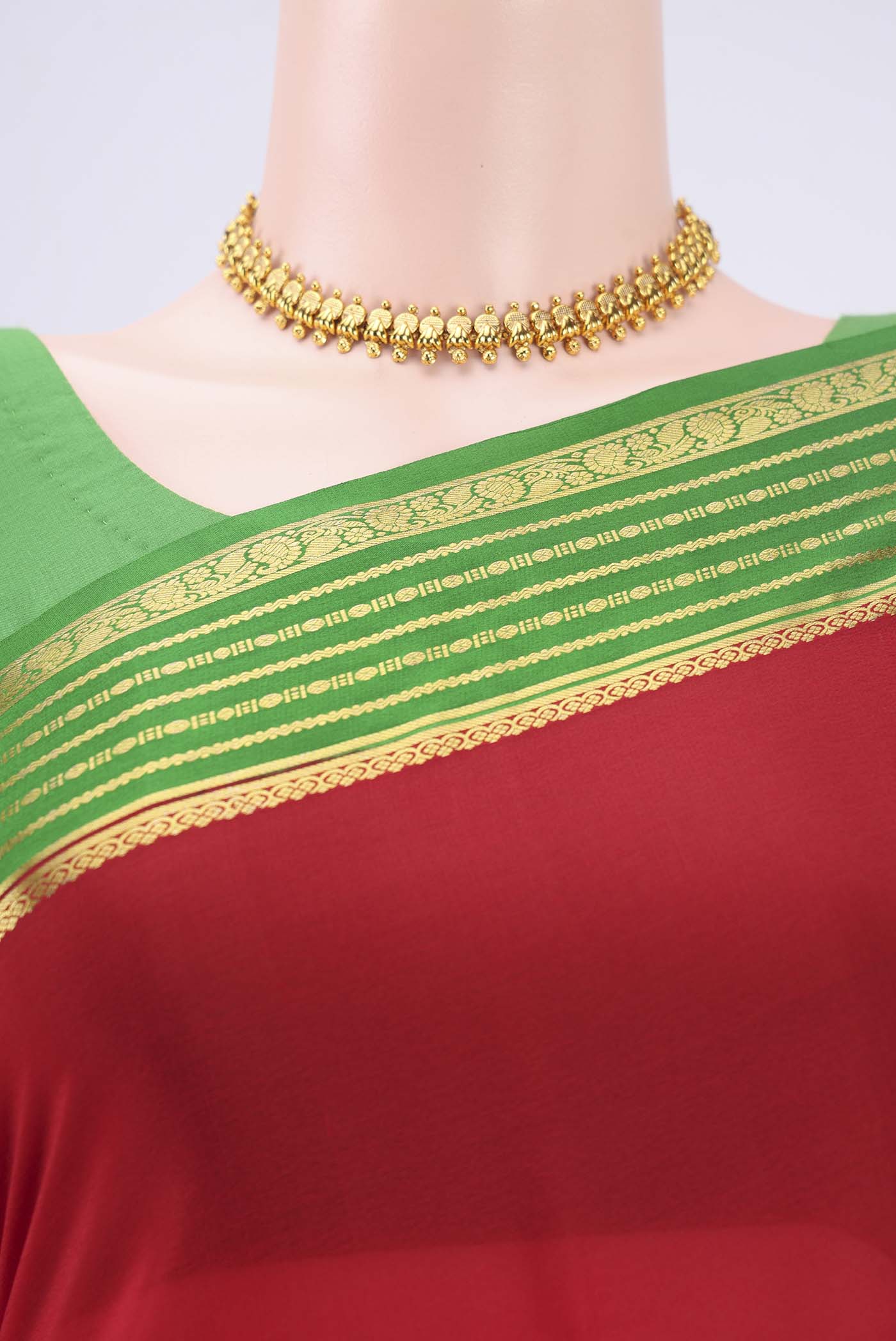 Border image of Red Mysore Crepe Saree with Plain Body and Zari Border. 