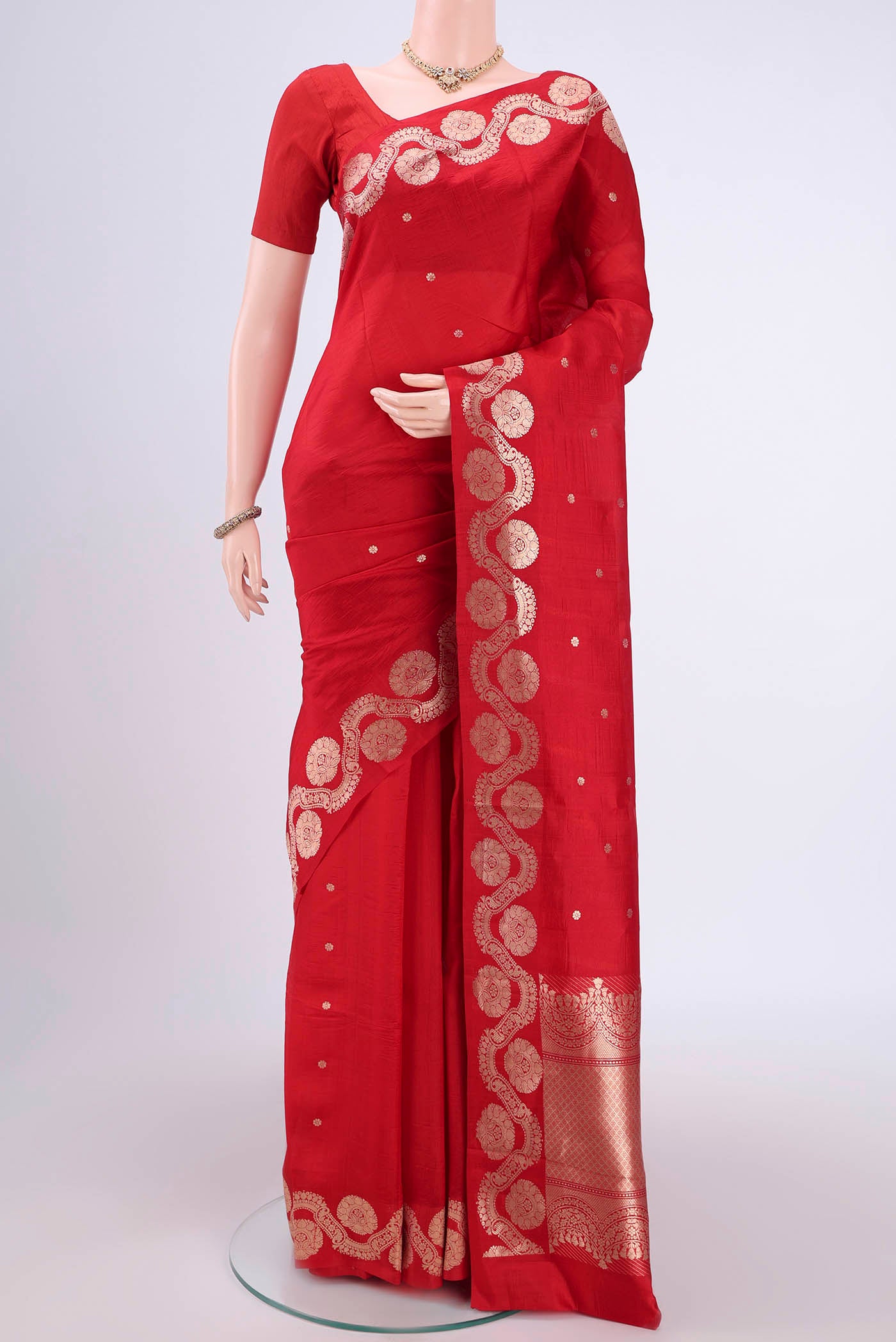 Red Banarasi Katan Silk Saree with Zari Butta on the body and Zari Border.  displayed on a mannequin