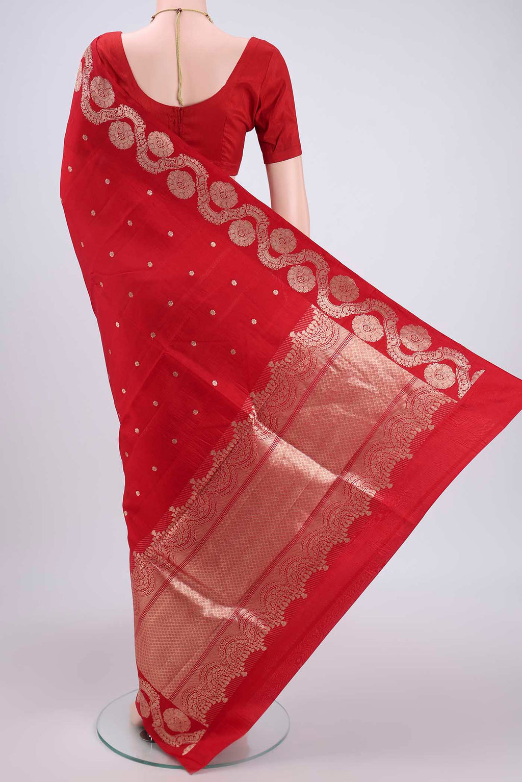 Flat view of Red Banarasi Katan Silk Saree with Zari Butta on the body and Zari Border. 