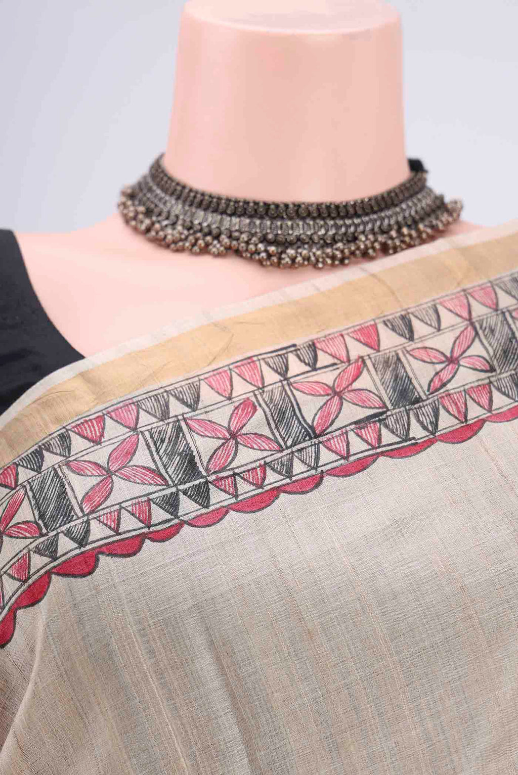 Border image of Beige Tussar Silk Saree with Printed design on the body and Zari Border. 