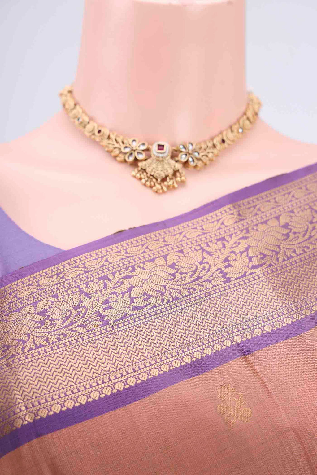 Border image of Rose Gold Soft Silk Saree with Zari Butta on the body and Zari Border. 