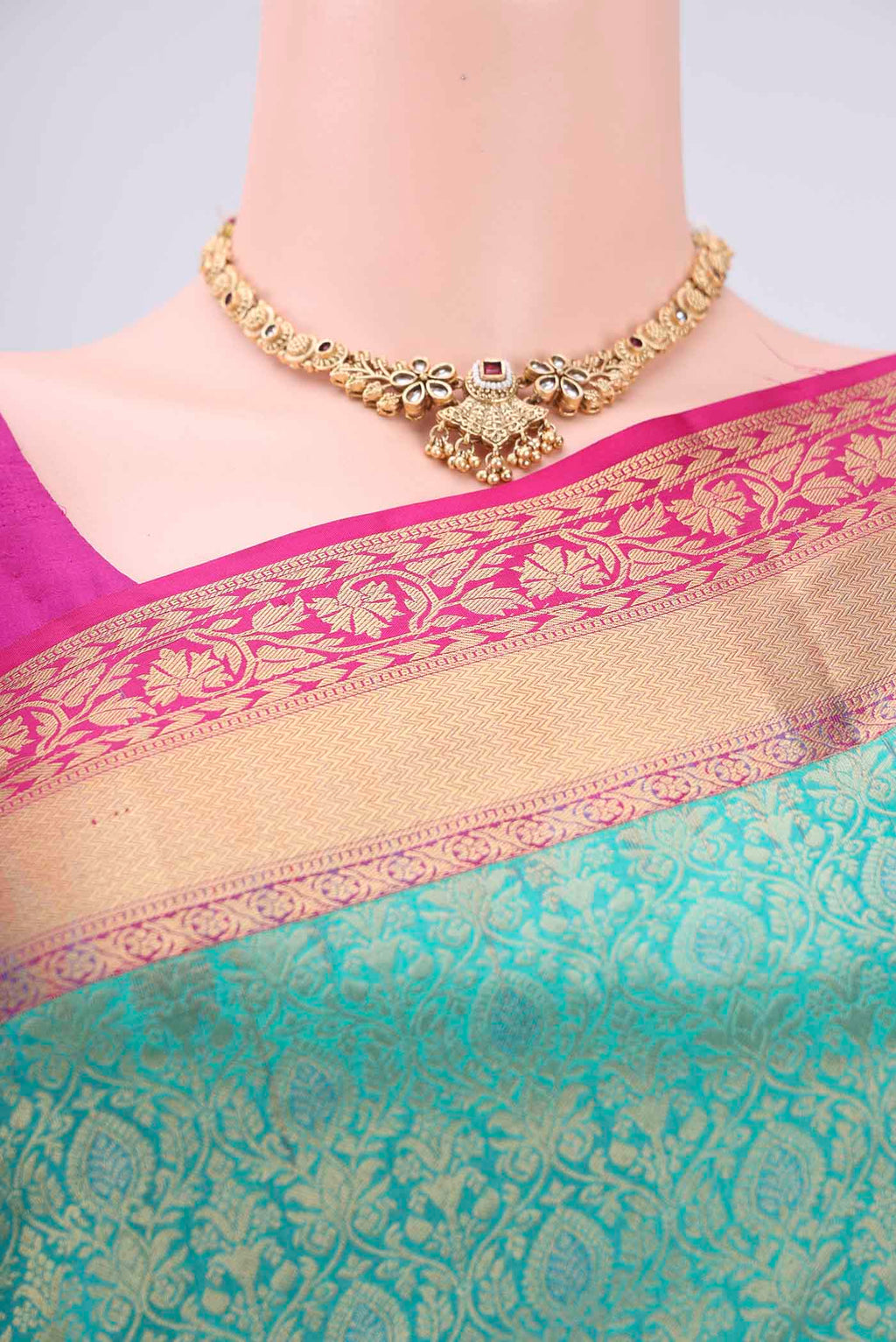 Border image of Turquoise Soft Silk Saree with Zari Brocade on the body and Zari Border. 