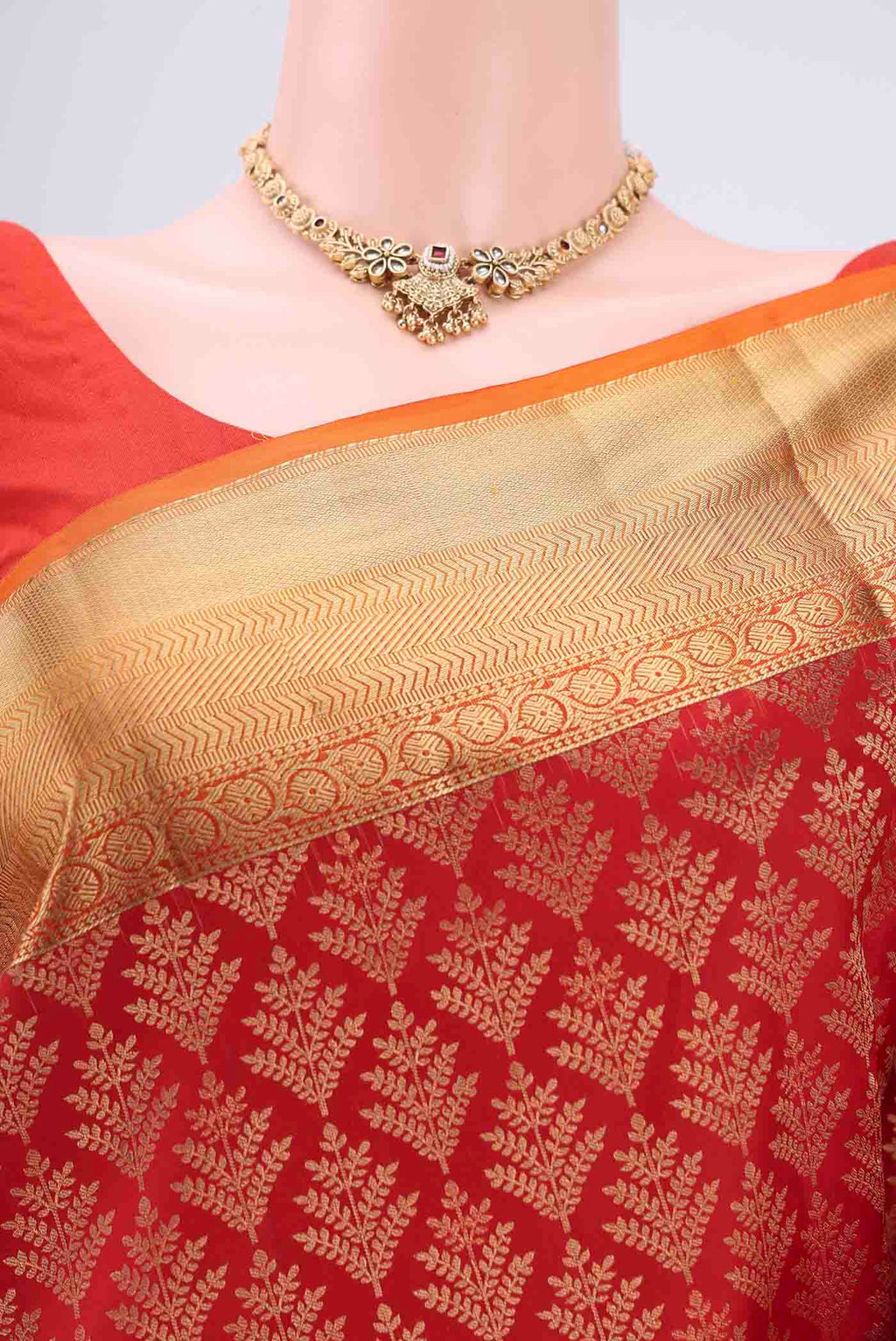 Border image of Red Soft Silk Saree with Zari Brocade on the body and Zari Border. 