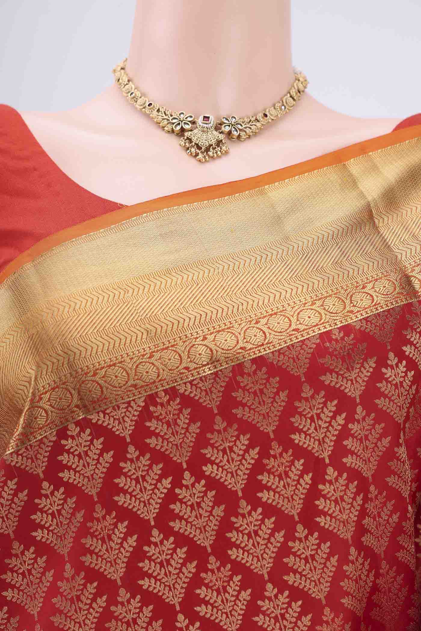 Border image of Red Soft Silk Saree with Zari Brocade on the body and Zari Border. 