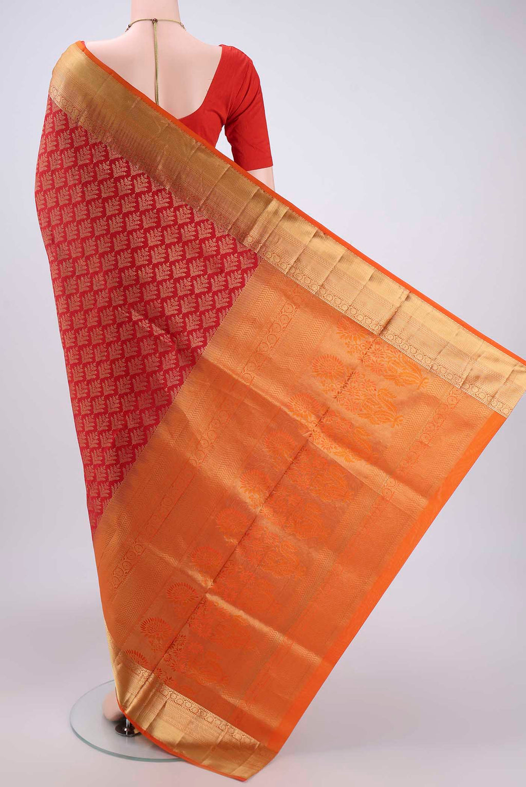 Flat view of Red Soft Silk Saree with Zari Brocade on the body and Zari Border. 