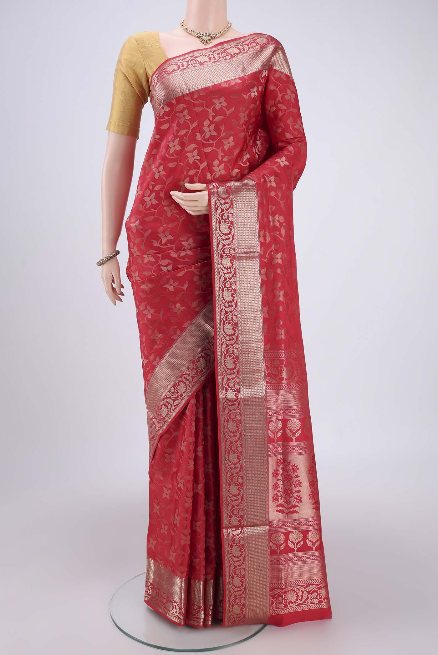 Dark Pink Soft Silk Saree with Zari Brocade on the body and Zari Border.  displayed on a mannequin