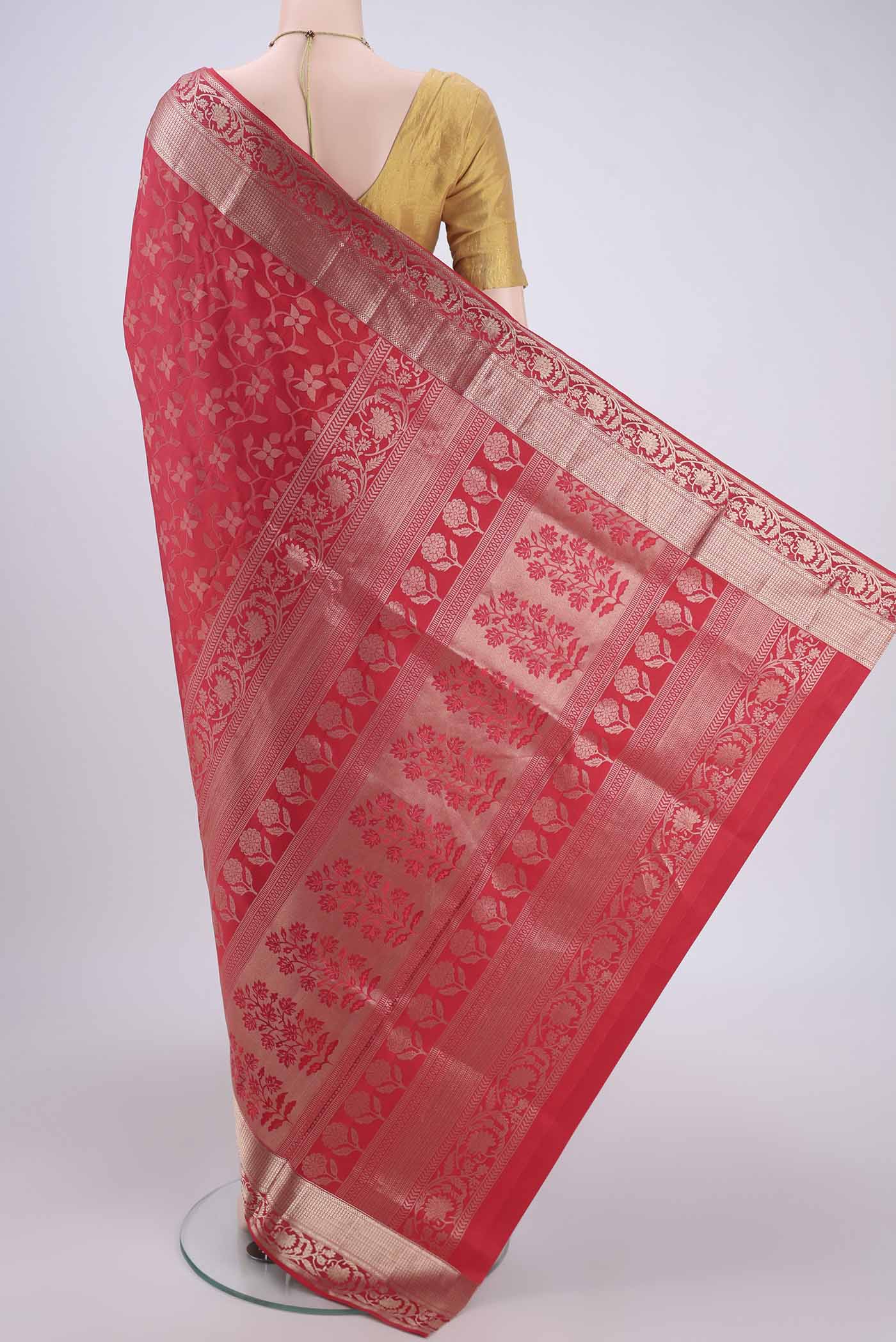 Flat view of Dark Pink Soft Silk Saree with Zari Brocade on the body and Zari Border. 