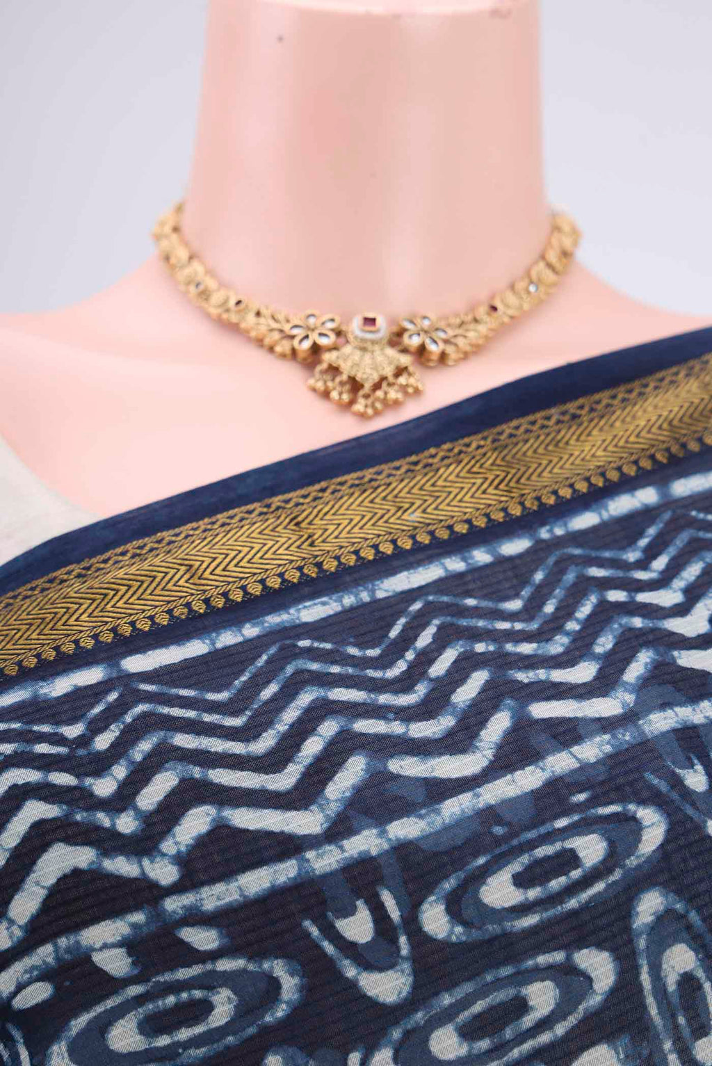 Border image of Indigo Maheshwari Silk Cotton Saree with Batik Print on the body and Zari Border. 