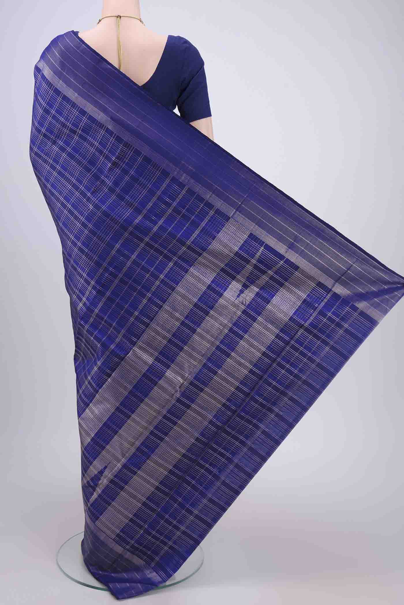 Flat view of Royal Blue Dual Tone Kanjivaram Silk Saree with Checked design on the body and Zari Border. 