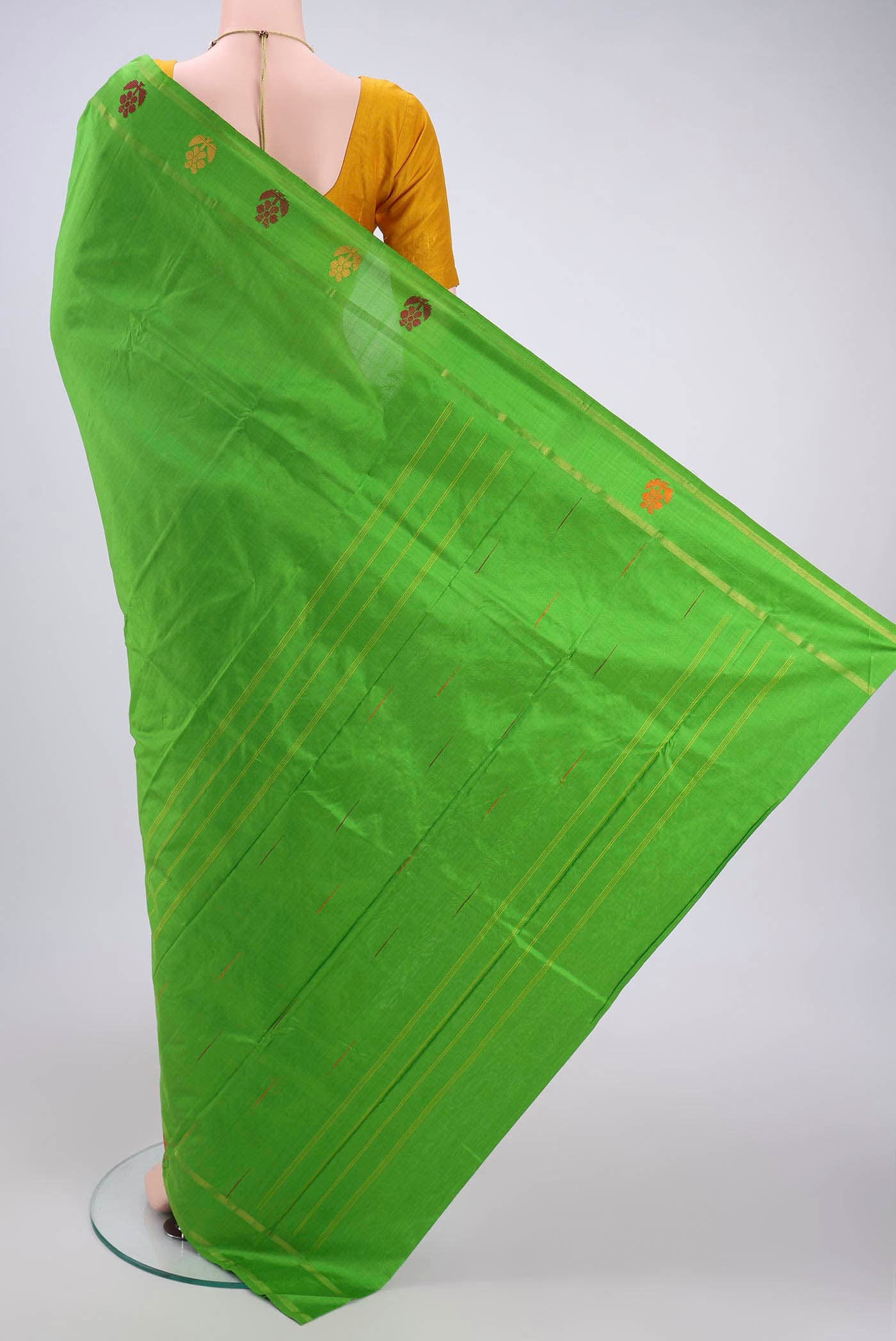 Flat view of Light Green Dual Tone Kanchipuram Silk Saree with Plain Body and Zari And Thread Border. 