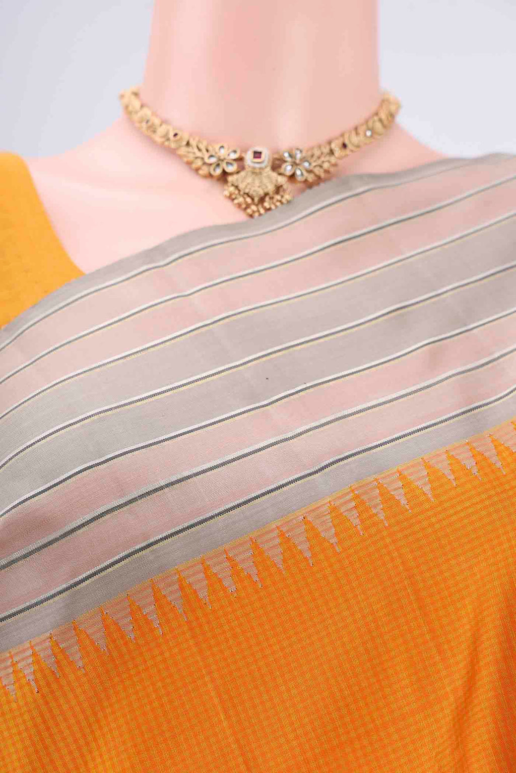 Border image of Yellow Kanjivaram Silk Saree with Checked design on the body and Zari Border. 