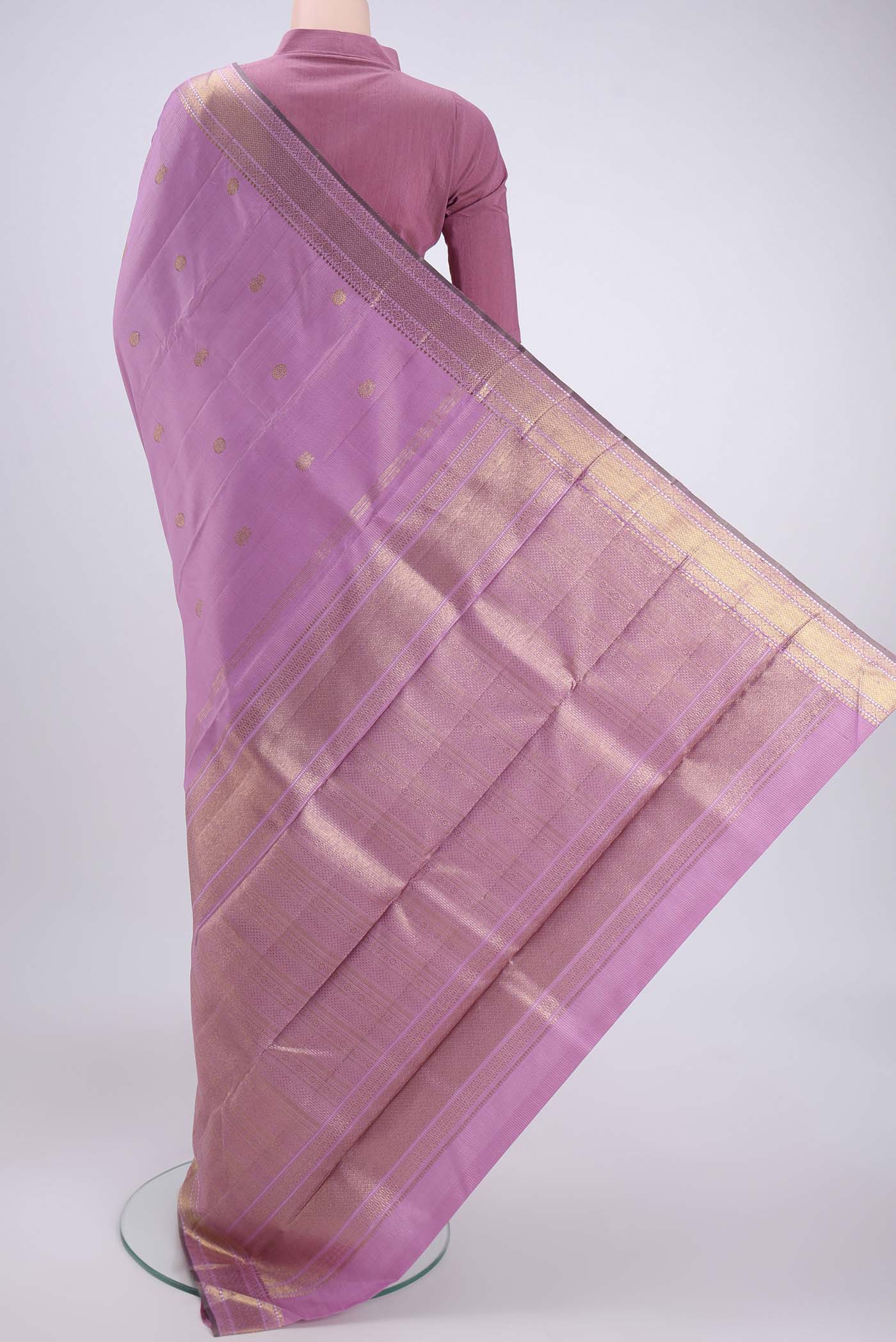 Flat view of Lilac Kanjivaram Silk Saree with Stripes on the body and Zari Border. 