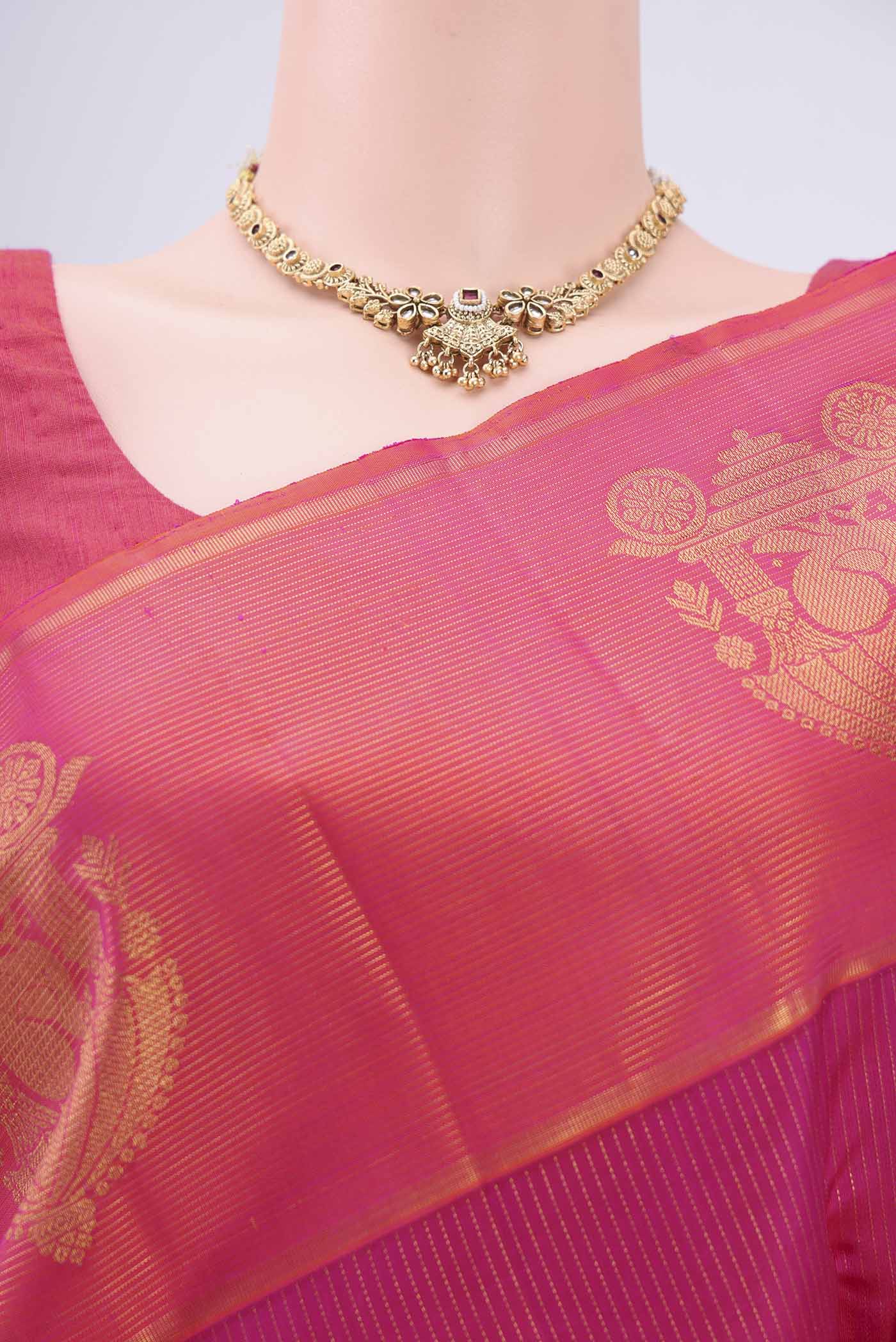 Border image of Dark Pink Kanjivaram Silk Saree with Stripes on the body and Zari Border. 