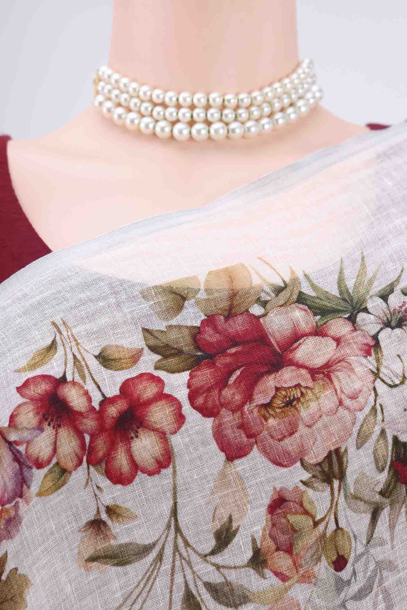 Border image of Off White Linen Saree with Floral Print on the body and Zari Border. 