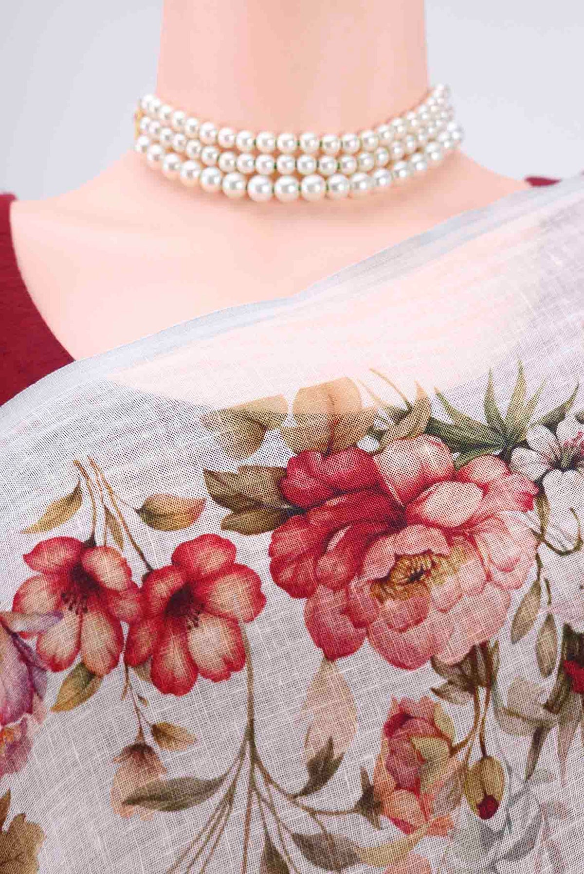 Border image of Off White Linen Saree with Floral Print on the body and Zari Border. 