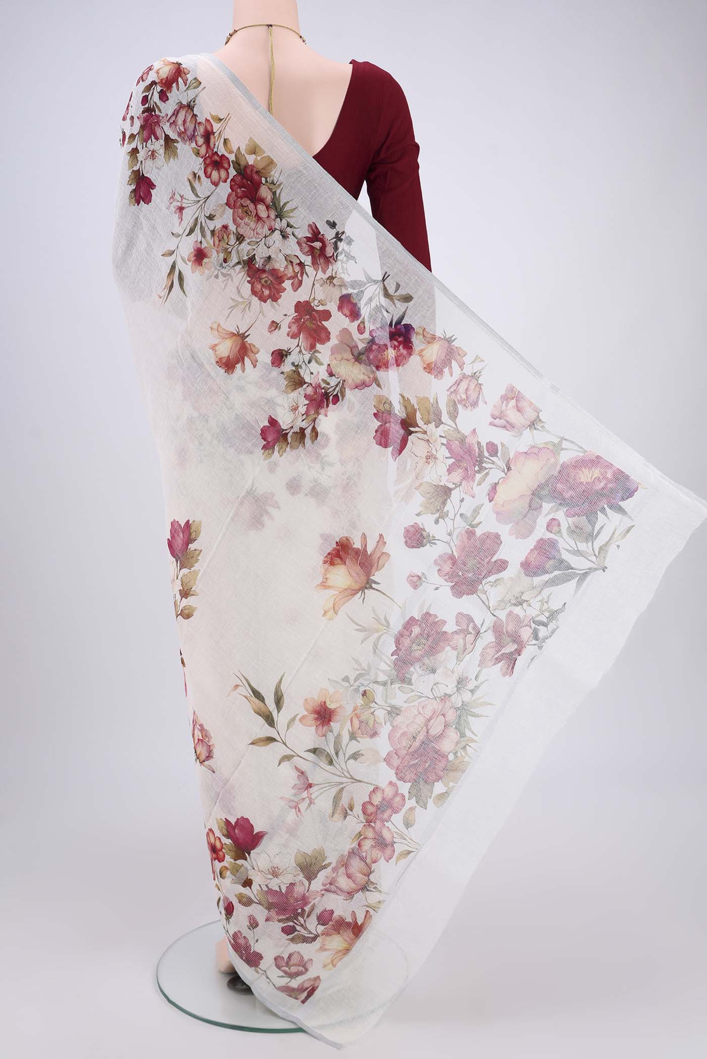 Flat view of Off White Linen Saree with Floral Print on the body and Zari Border. 