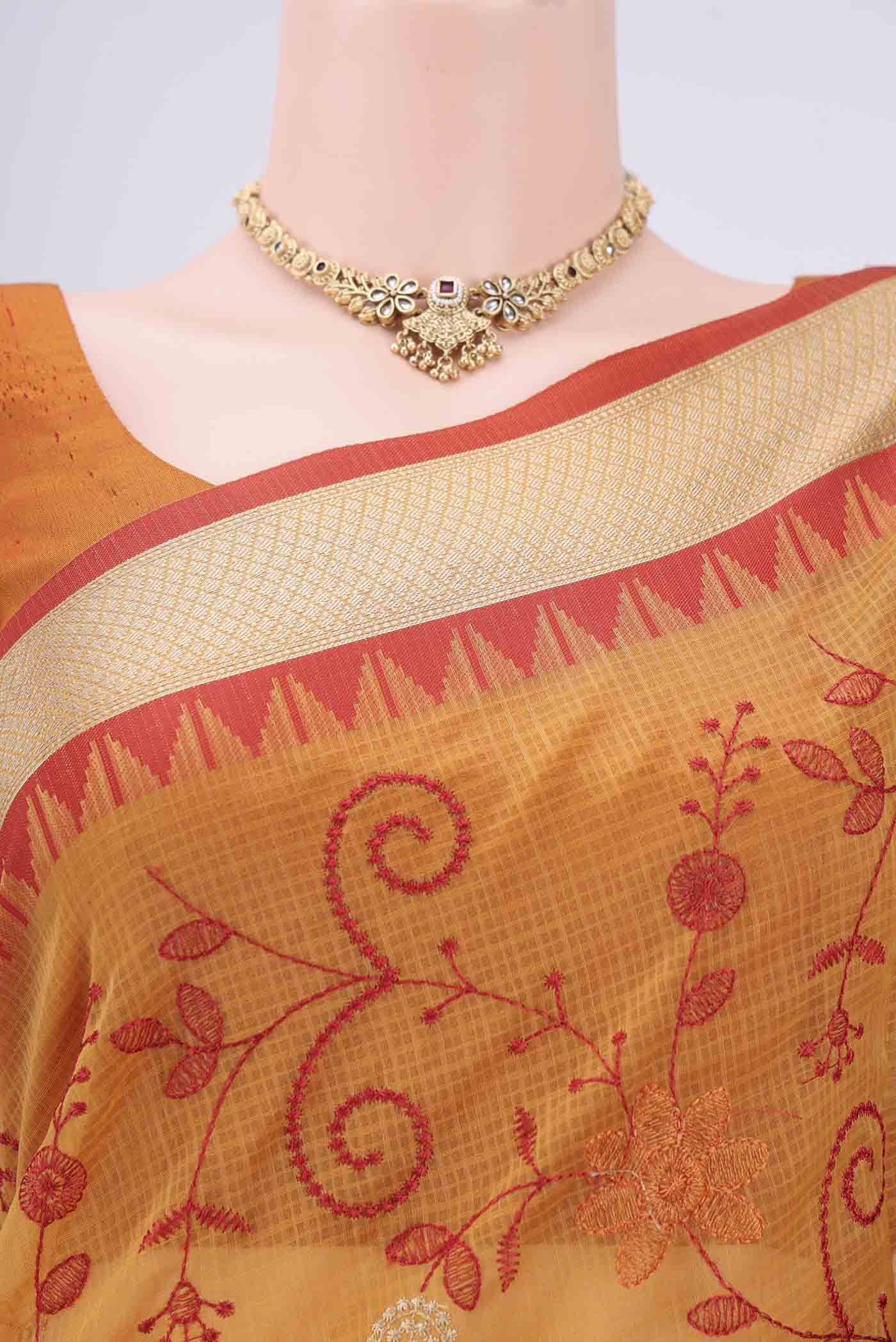 Border image of Mustard Kota Silk Saree with Embroidery on the body and Plain Border. 