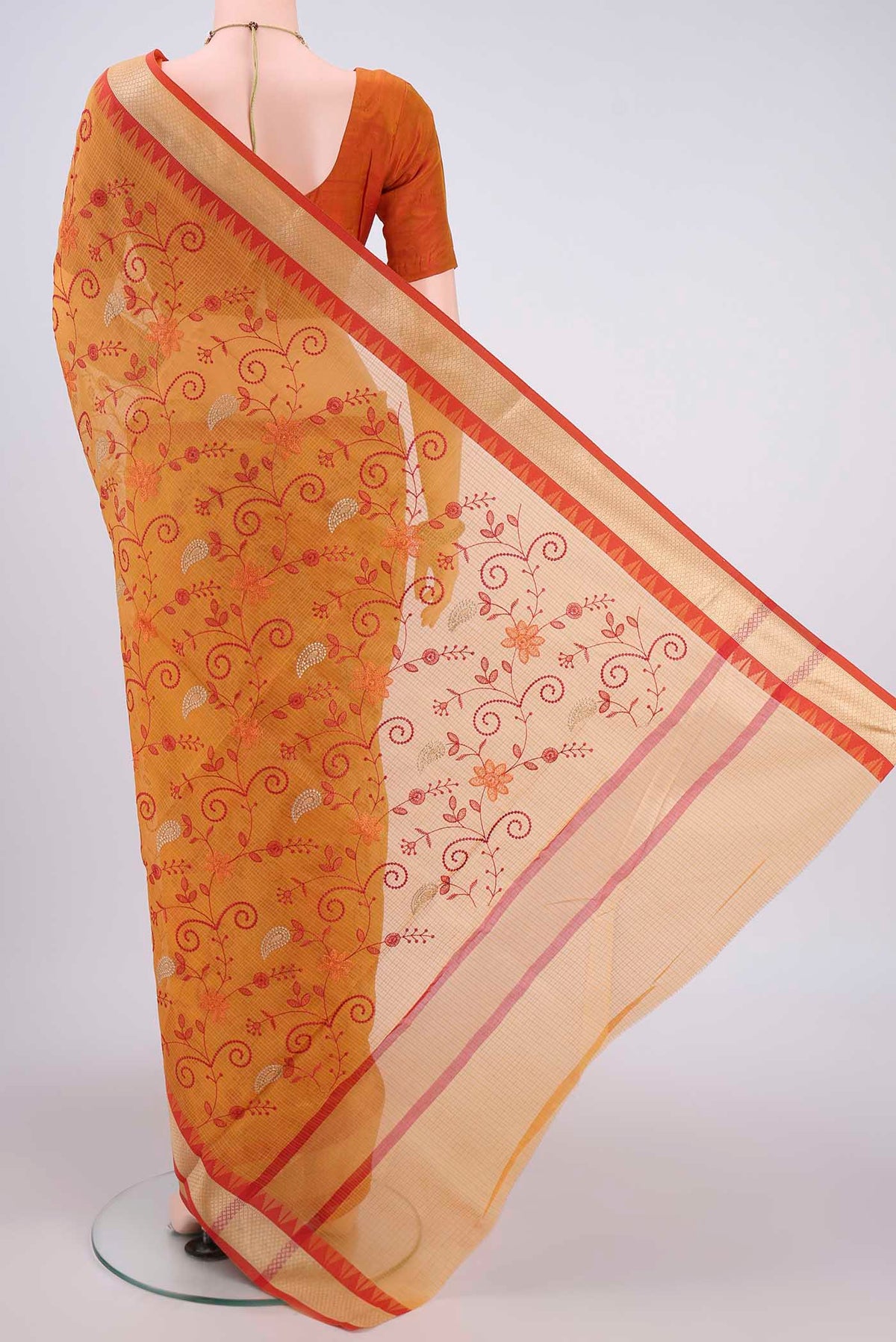 Flat view of Mustard Kota Silk Saree with Embroidery on the body and Plain Border. 