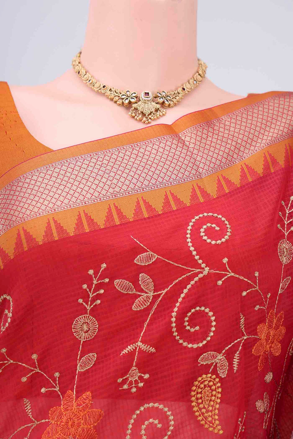 Border image of Red Kota Silk Saree with Embroidery on the body and Plain Border. 