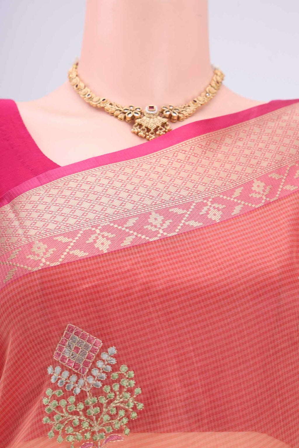 Border image of Peach Kota Silk Saree with Embroidery on the body and Plain Border. 