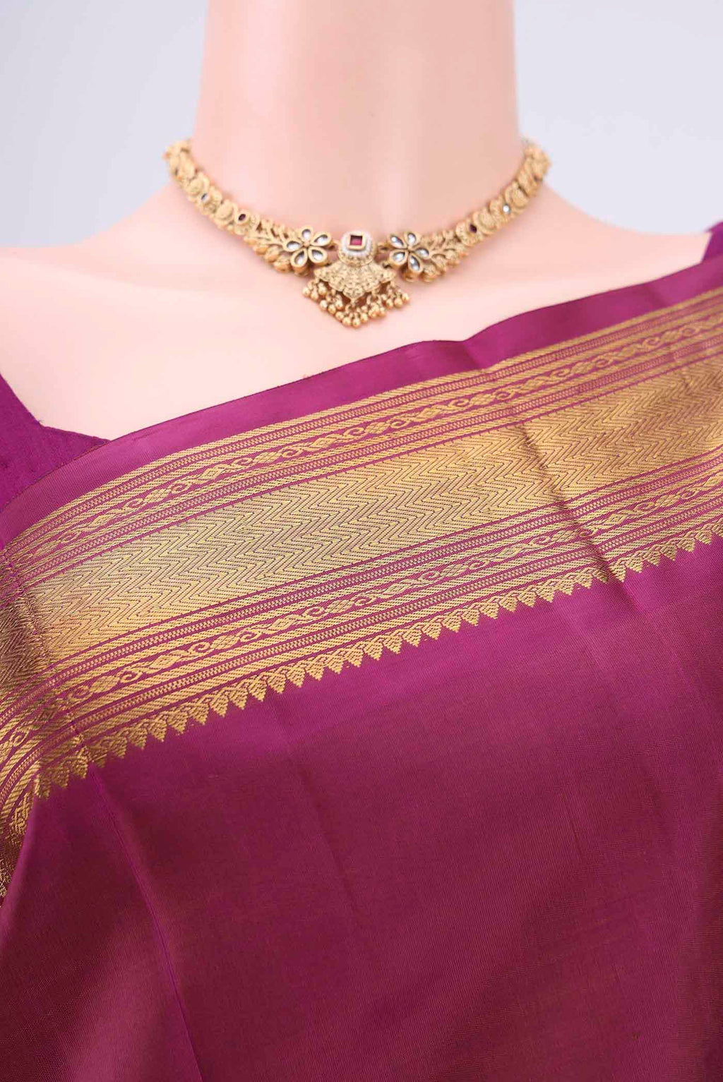 Border image of Magenta Kanchipuram Silk Saree with Zari Butta on the body and Zari Border. 