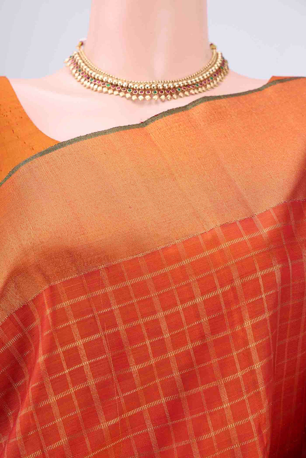 Border image of Pure Silk Pure Zari Rust Kanjivaram Saree with Checked design on the body and Zari Border. 