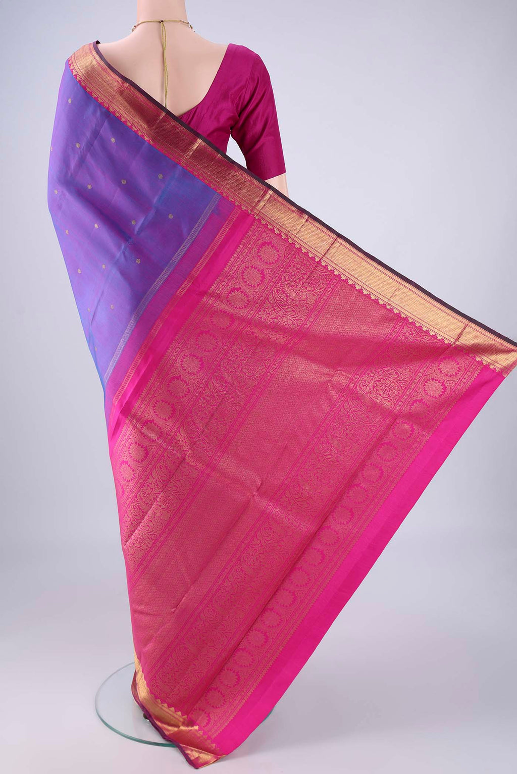 Flat view of Pure Silk Pure Zari Purple Kanjivaram Saree with Zari Butta on the body and Zari Border. 