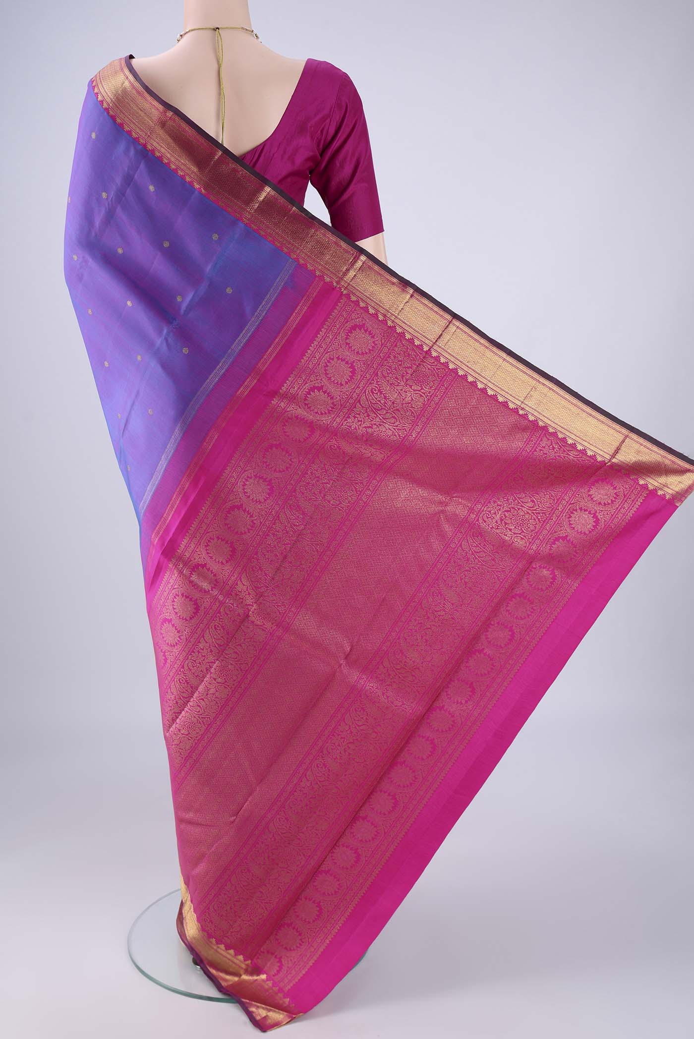 Flat view of Pure Silk Pure Zari Purple Kanjivaram Saree with Zari Butta on the body and Zari Border. 