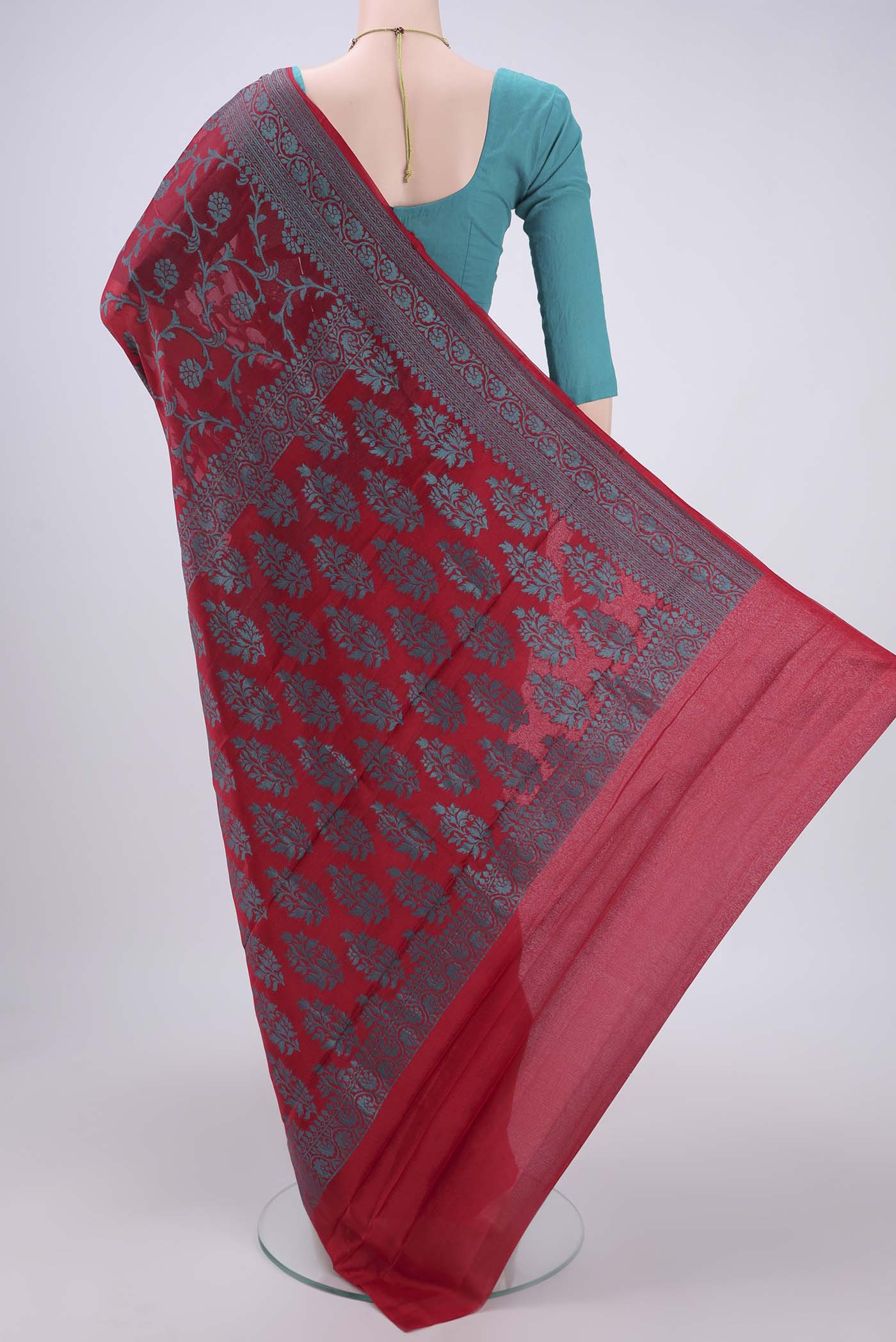 Flat view of Red Blended Banarasi Georgette Saree with Thread Brocade on the body and Zari Border. 