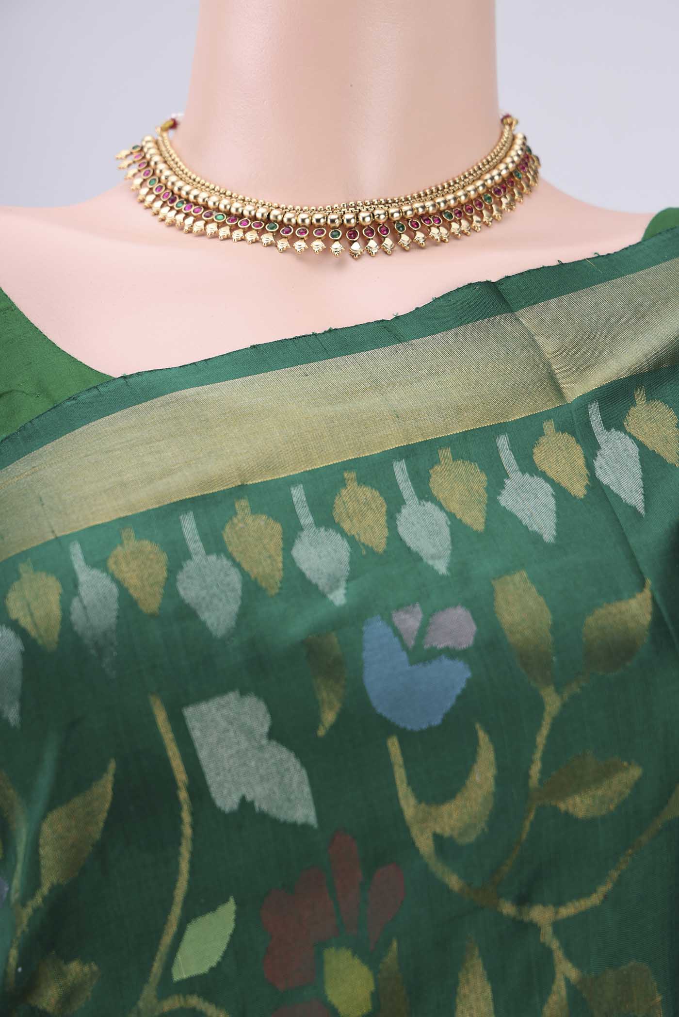 Border image of Green Uppada Silk Saree with Jamdani on the body and Zari Border. 