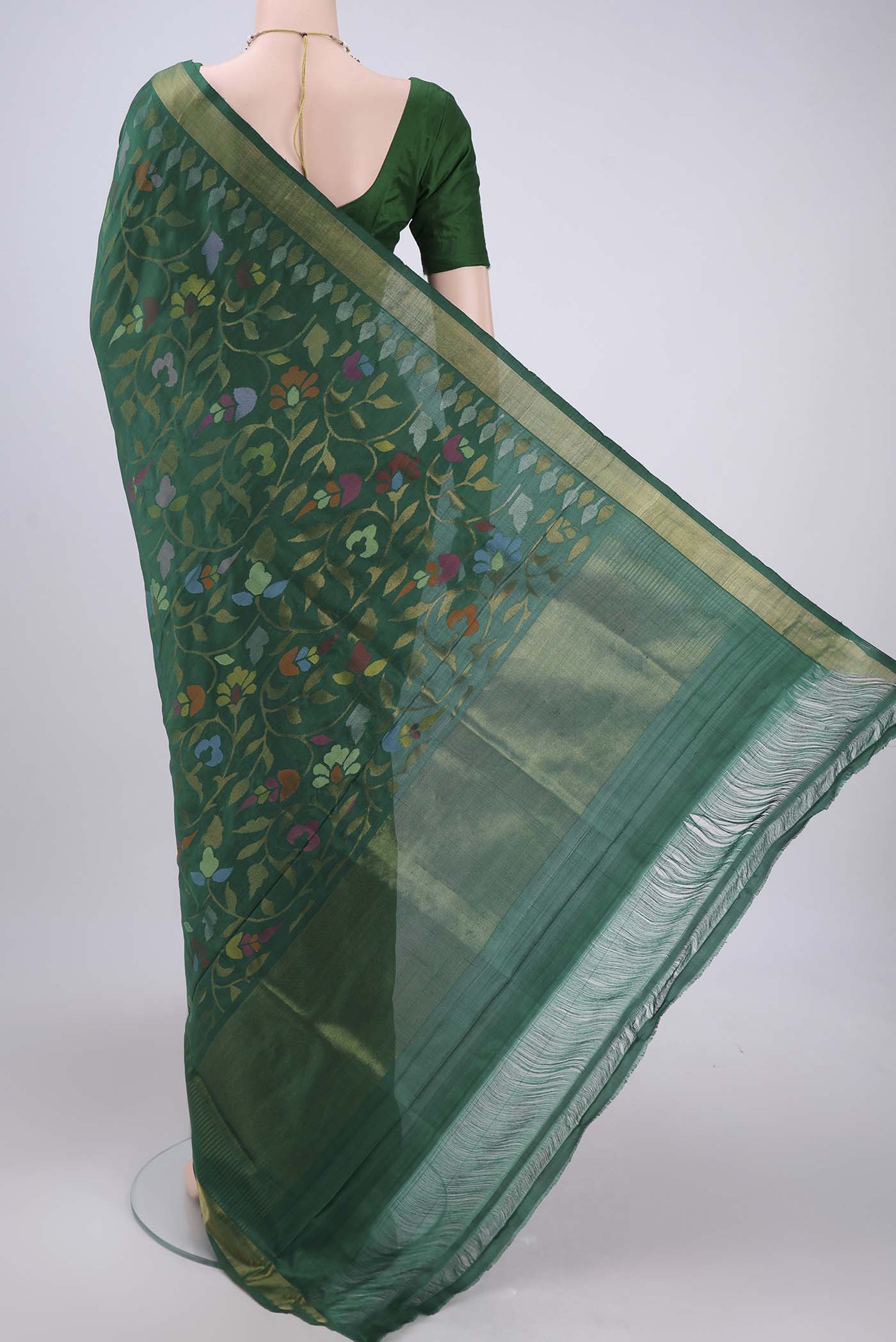 Flat view of Green Uppada Silk Saree with Jamdani on the body and Zari Border. 