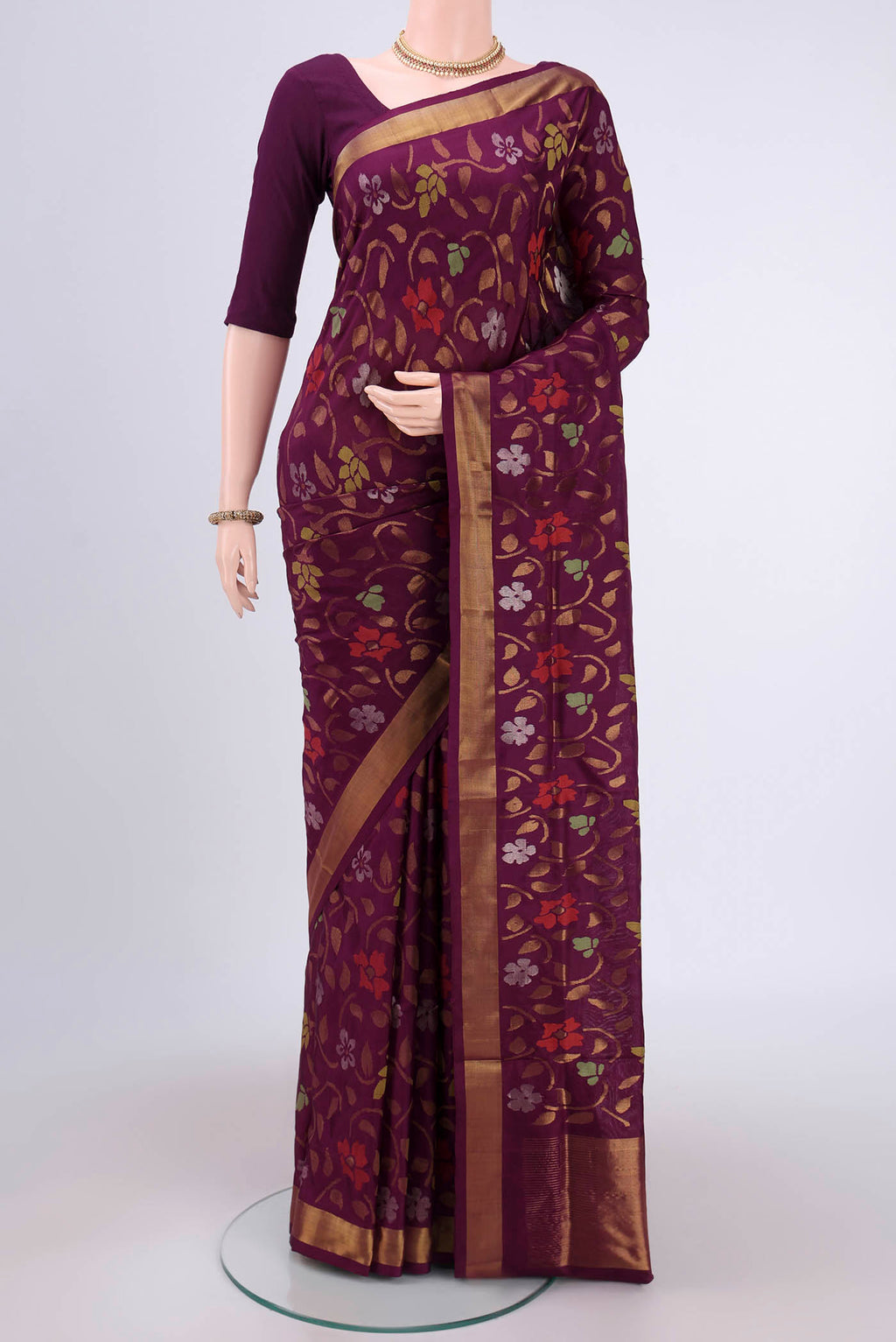 Purple Uppada Silk Saree with Jamdani on the body and Zari Border.  displayed on a mannequin