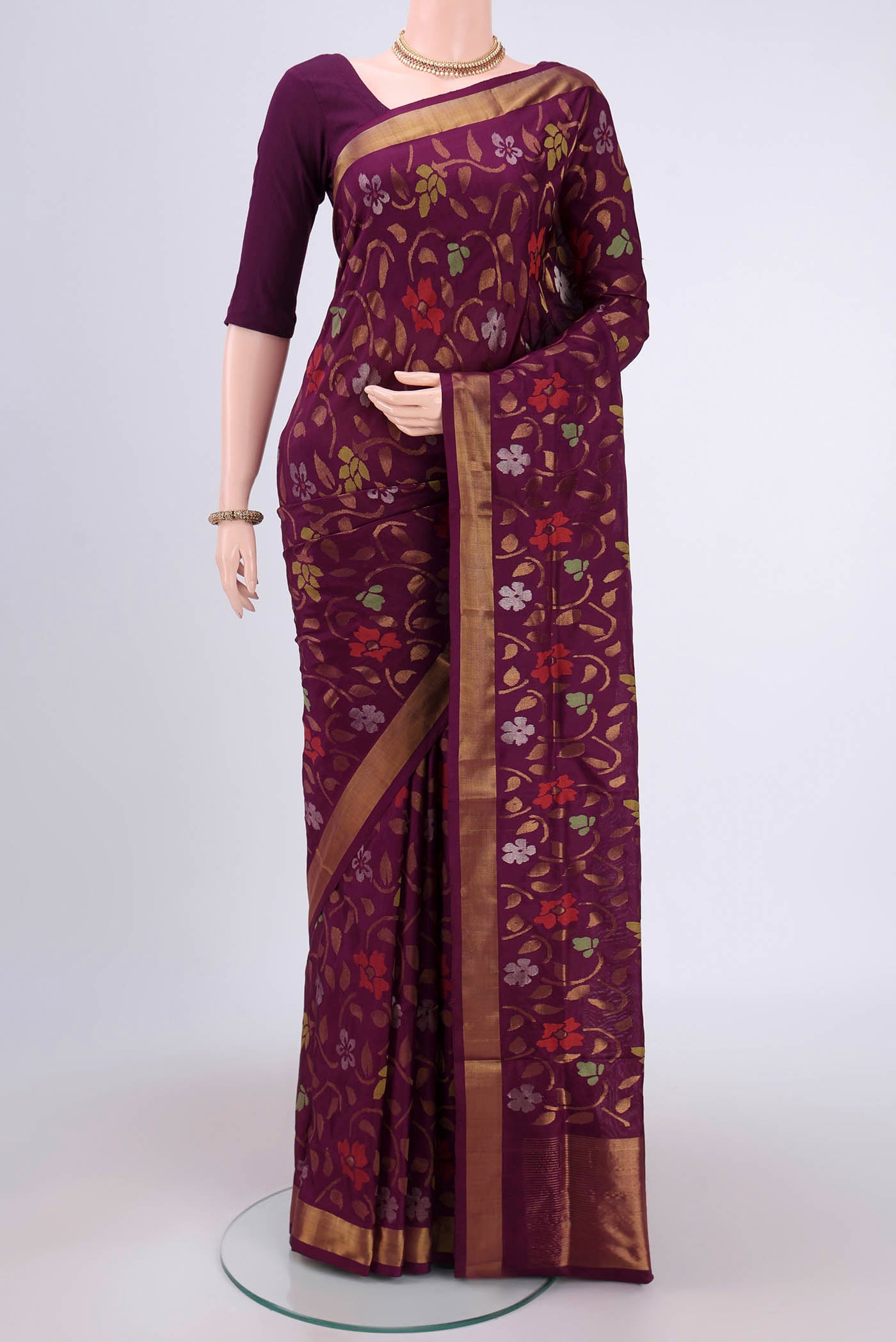Purple Uppada Silk Saree with Jamdani on the body and Zari Border.  displayed on a mannequin
