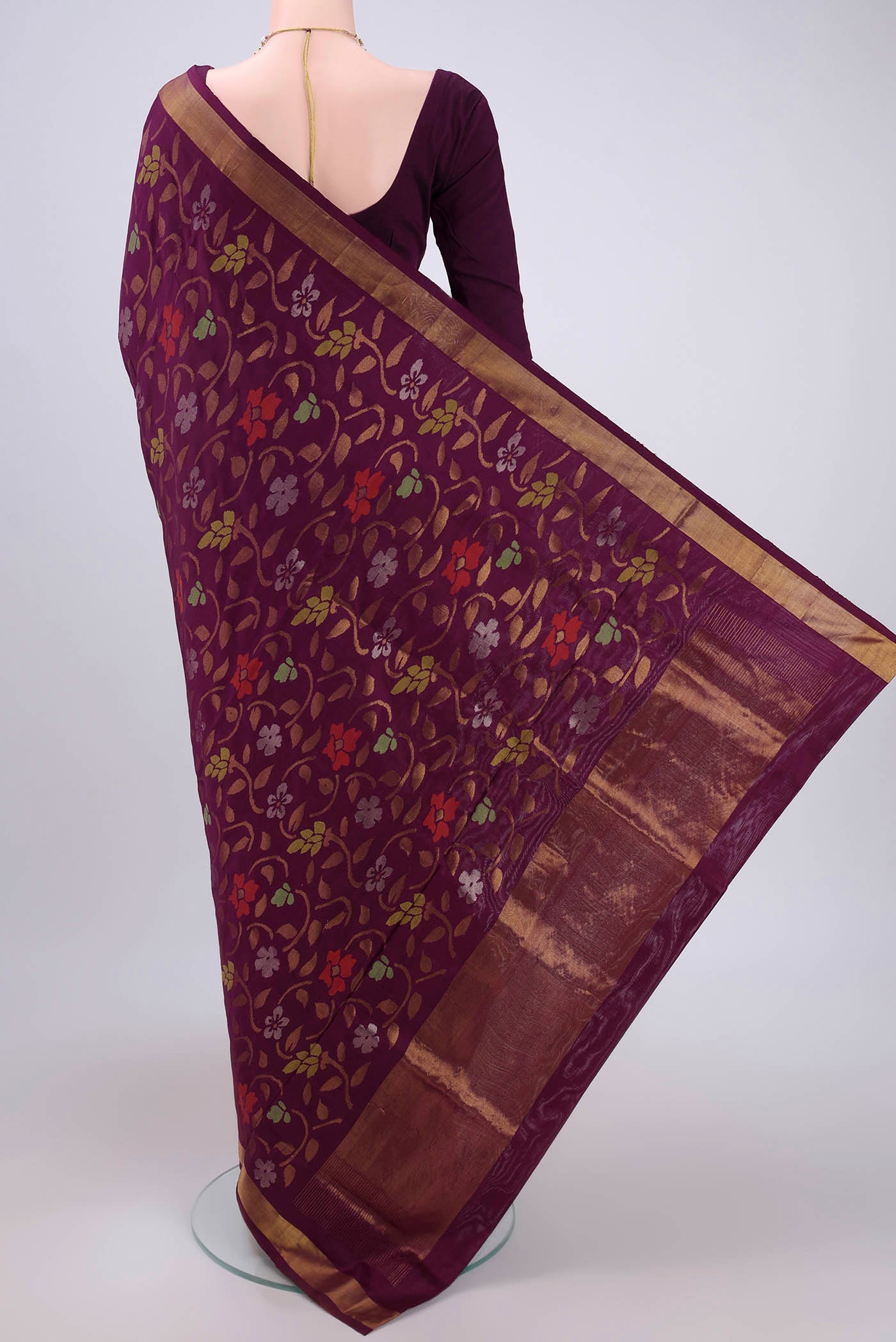 Flat view of Purple Uppada Silk Saree with Jamdani on the body and Zari Border. 