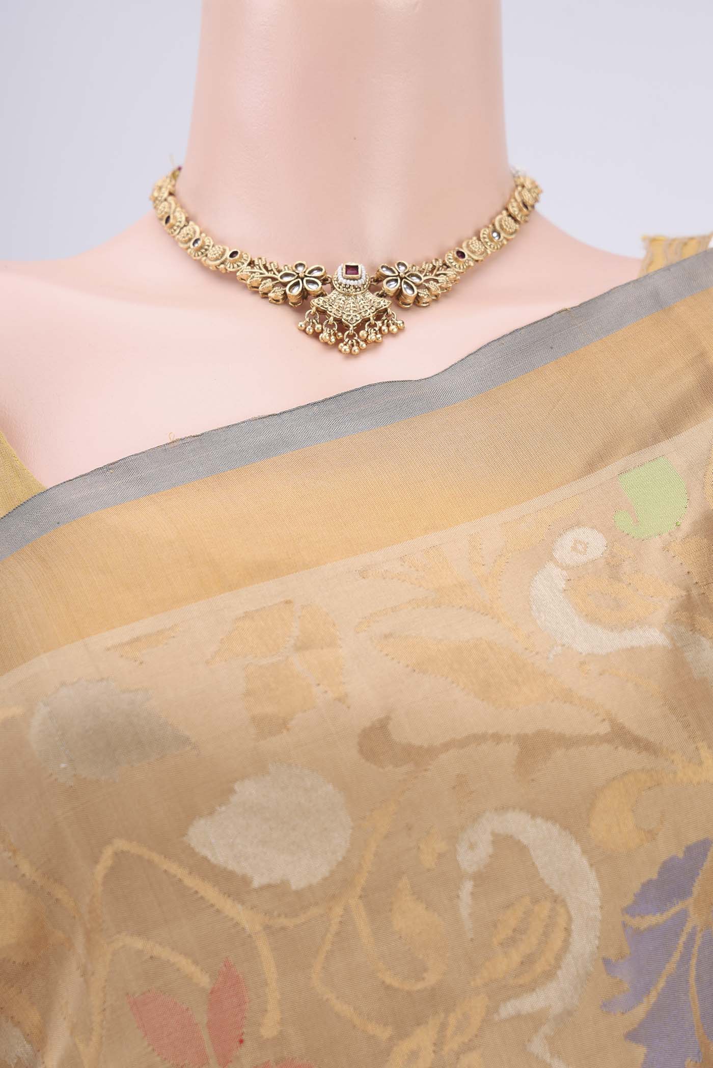 Border image of Beige Uppada Silk Saree with Jamdani on the body and Zari Border. 
