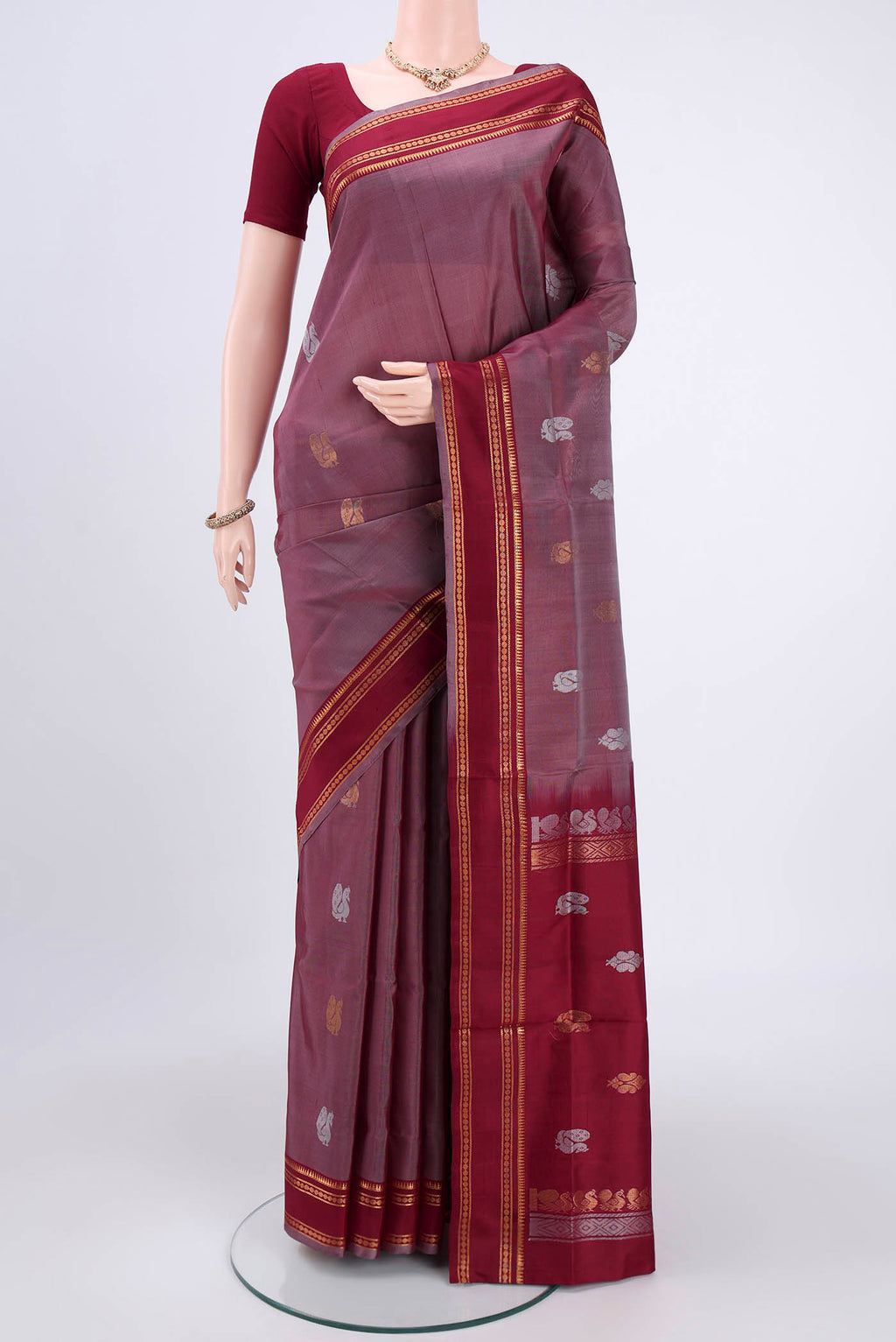 Davys Grey Dual Tone Uppada Silk Saree with Zari Butta on the body and Zari Border.  displayed on a mannequin