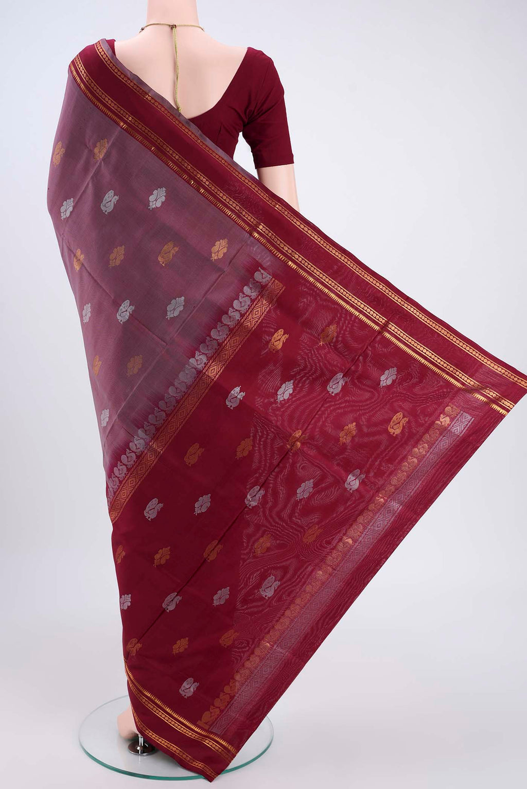 Flat view of Davys Grey Dual Tone Uppada Silk Saree with Zari Butta on the body and Zari Border. 