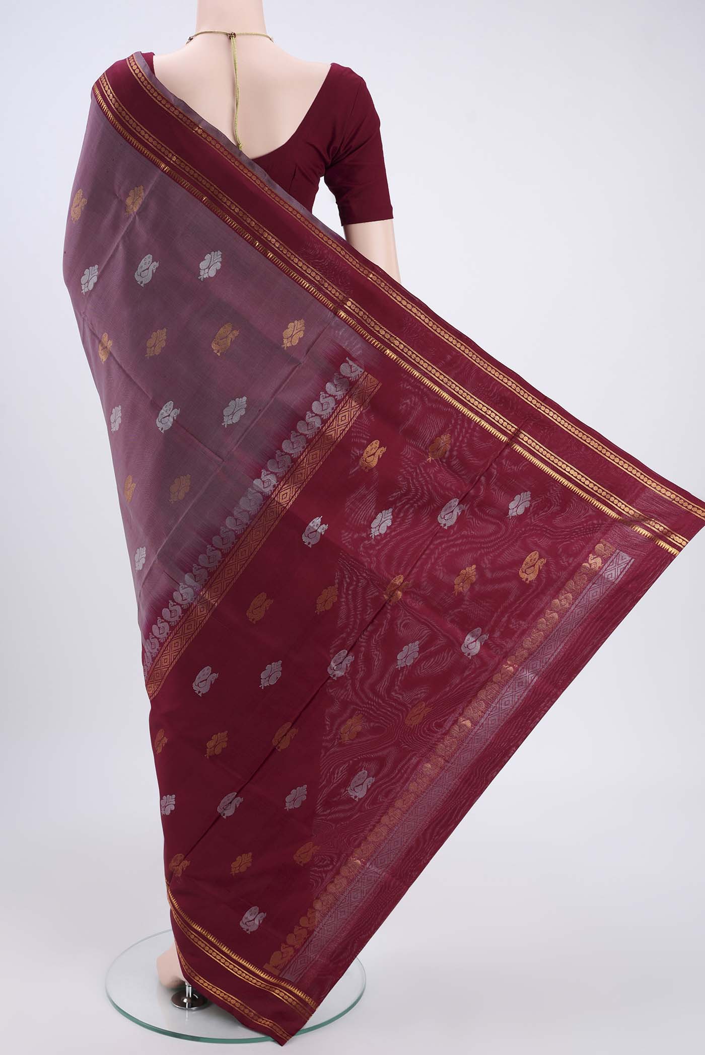 Flat view of Davys Grey Dual Tone Uppada Silk Saree with Zari Butta on the body and Zari Border. 