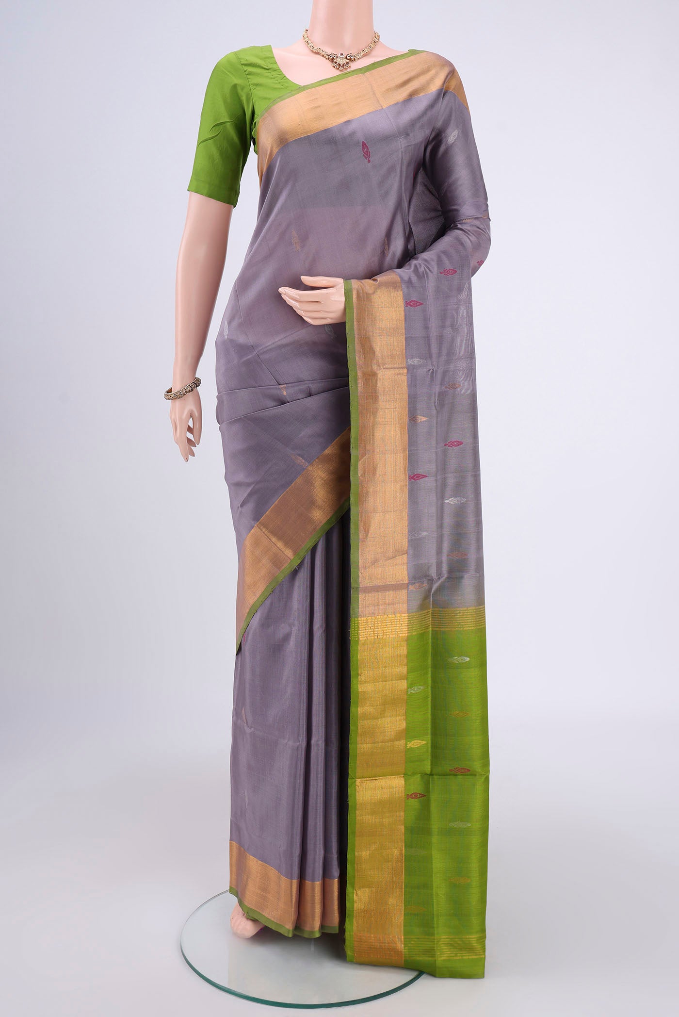 Blue Grey Dual Tone Uppada Silk Saree with Zari And Thread Butta on the body and Zari Border.  displayed on a mannequin