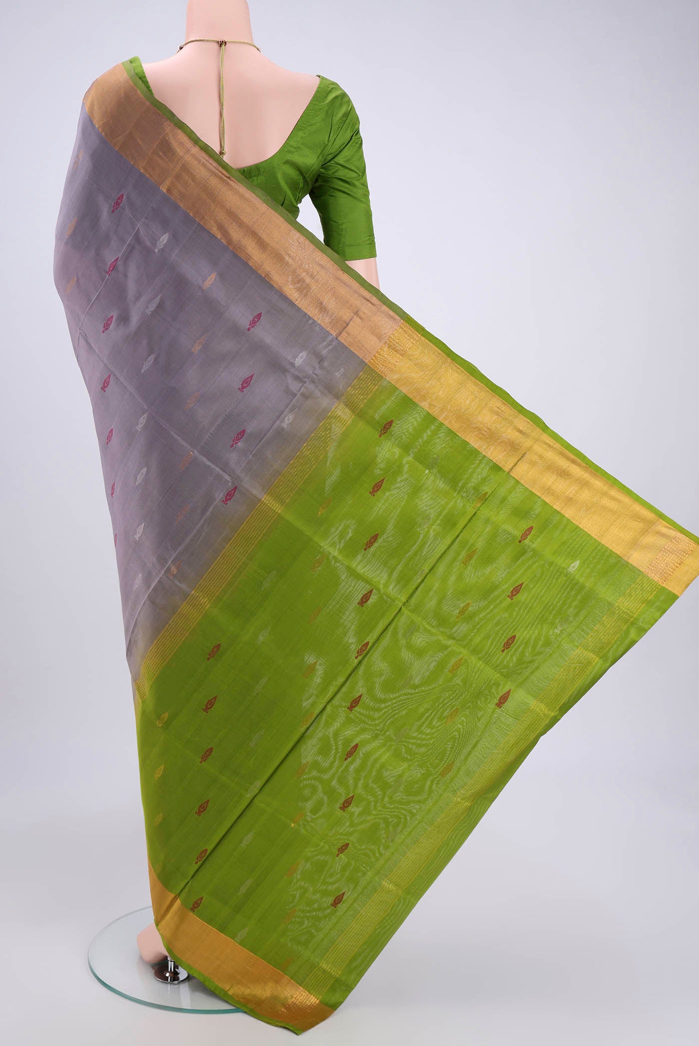 Flat view of Blue Grey Dual Tone Uppada Silk Saree with Zari And Thread Butta on the body and Zari Border. 