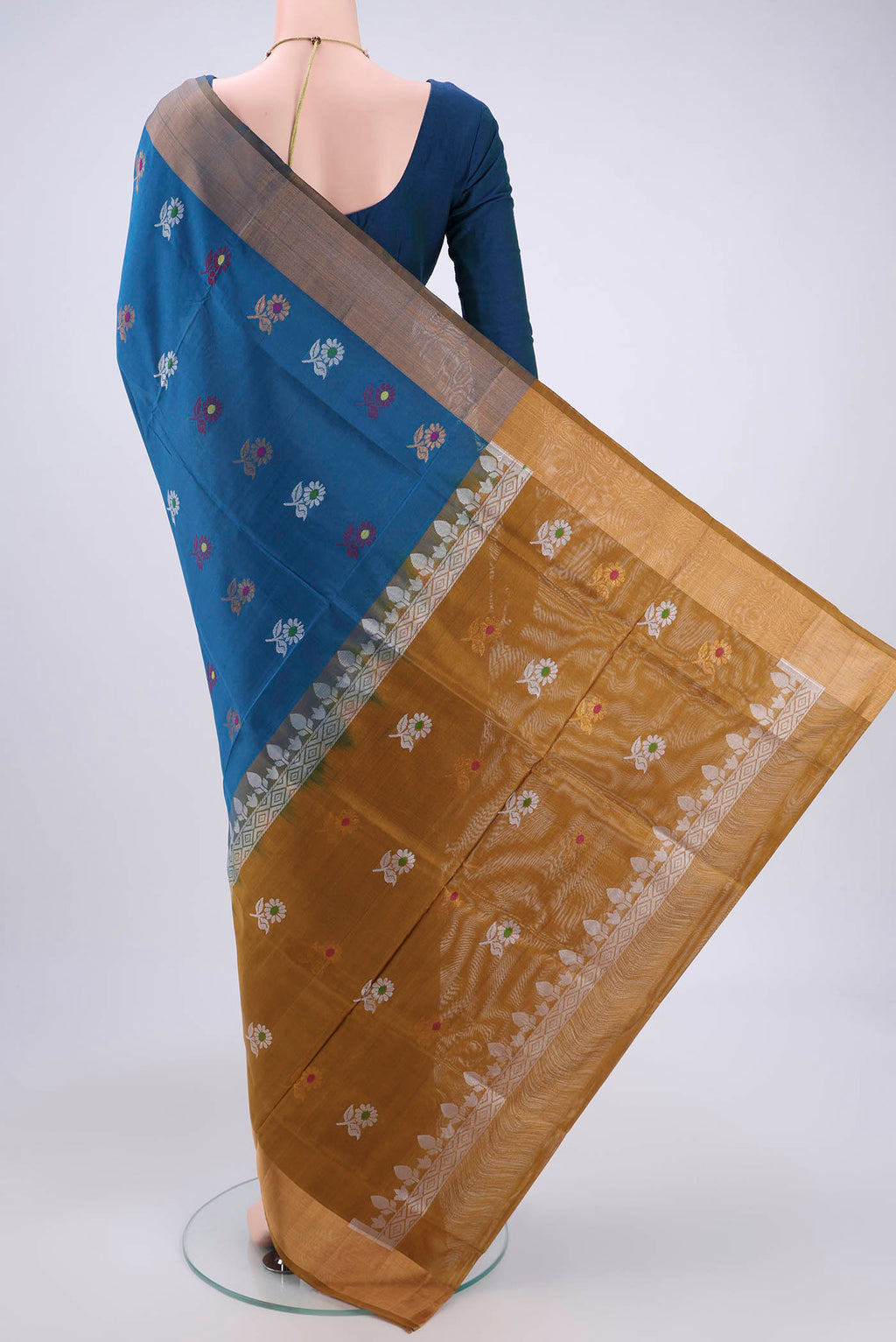 Flat view of Blue Dual Tone Uppada Silk Saree with Zari And Thread Butta on the body and Zari Border. 