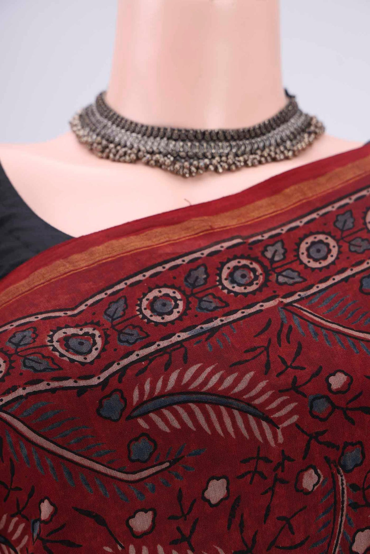Border image of Maroon Chanderi Silk Cotton Saree with Ajrakh Print on the body and Zari Border. 