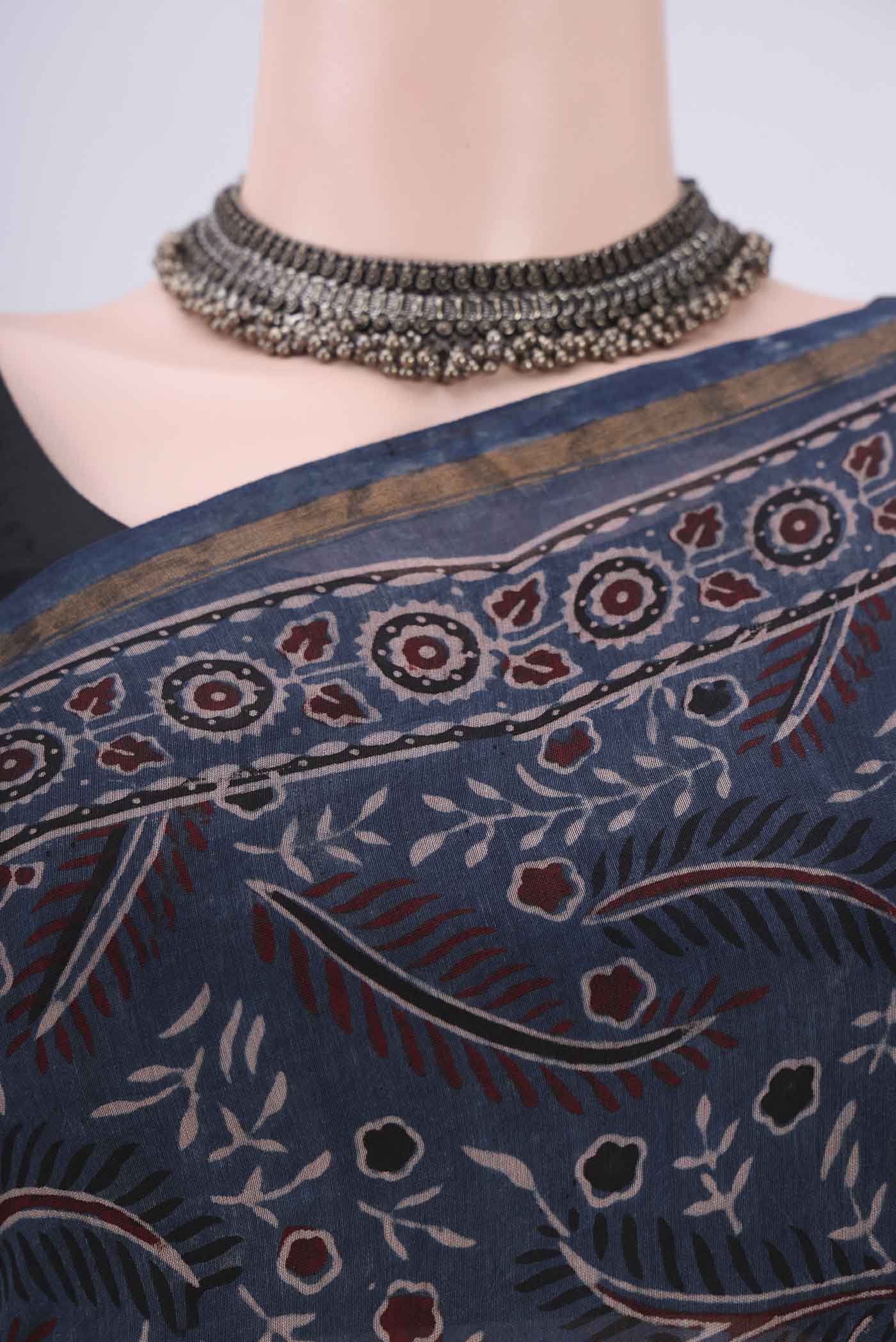 Border image of Indigo Chanderi Silk Cotton Saree with Ajrakh Print on the body and Zari Border. 