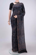 Indigo Chanderi Silk Cotton Saree with Ajrakh Print on the body and Zari Border.  displayed on a mannequin