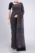 Blue Chanderi Silk Cotton Saree with Ajrakh Print on the body and Zari Border.  displayed on a mannequin