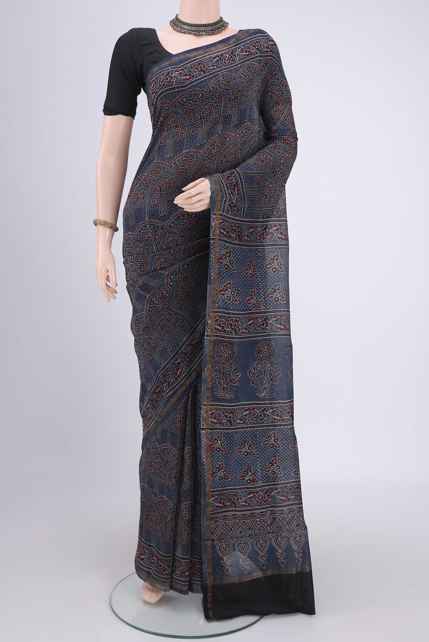 Blue Chanderi Silk Cotton Saree with Ajrakh Print on the body and Zari Border.  displayed on a mannequin
