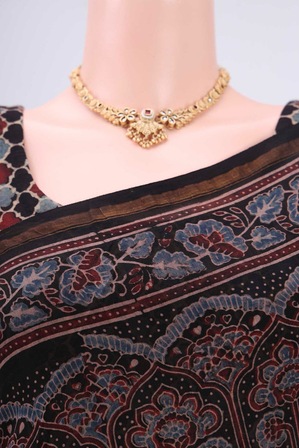 Border image of Black Chanderi Silk Cotton Saree with Ajrakh Print on the body and Zari Border. 